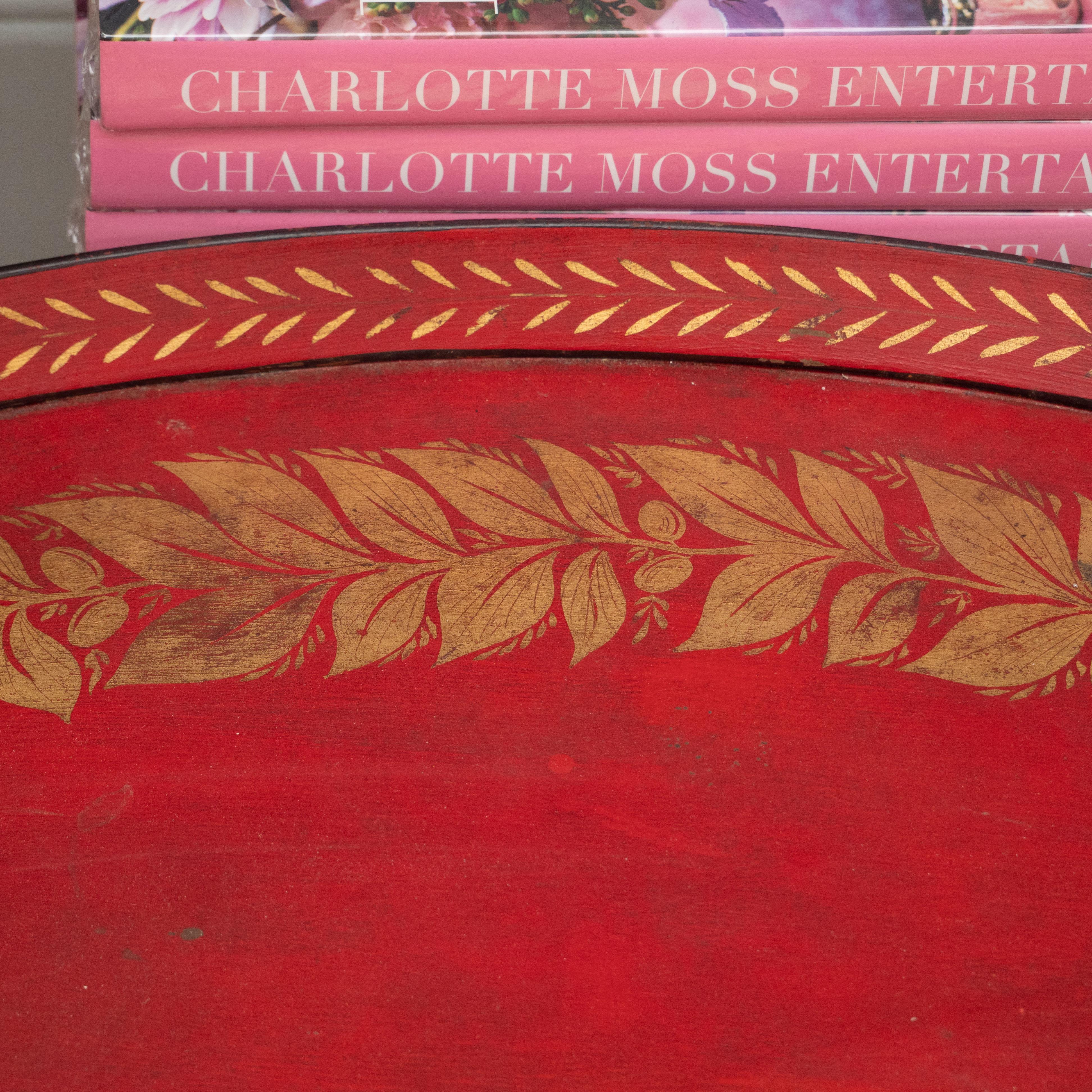 Red Tole Table with Decorative Oval Top and X-Frame Base In Good Condition In New York, NY