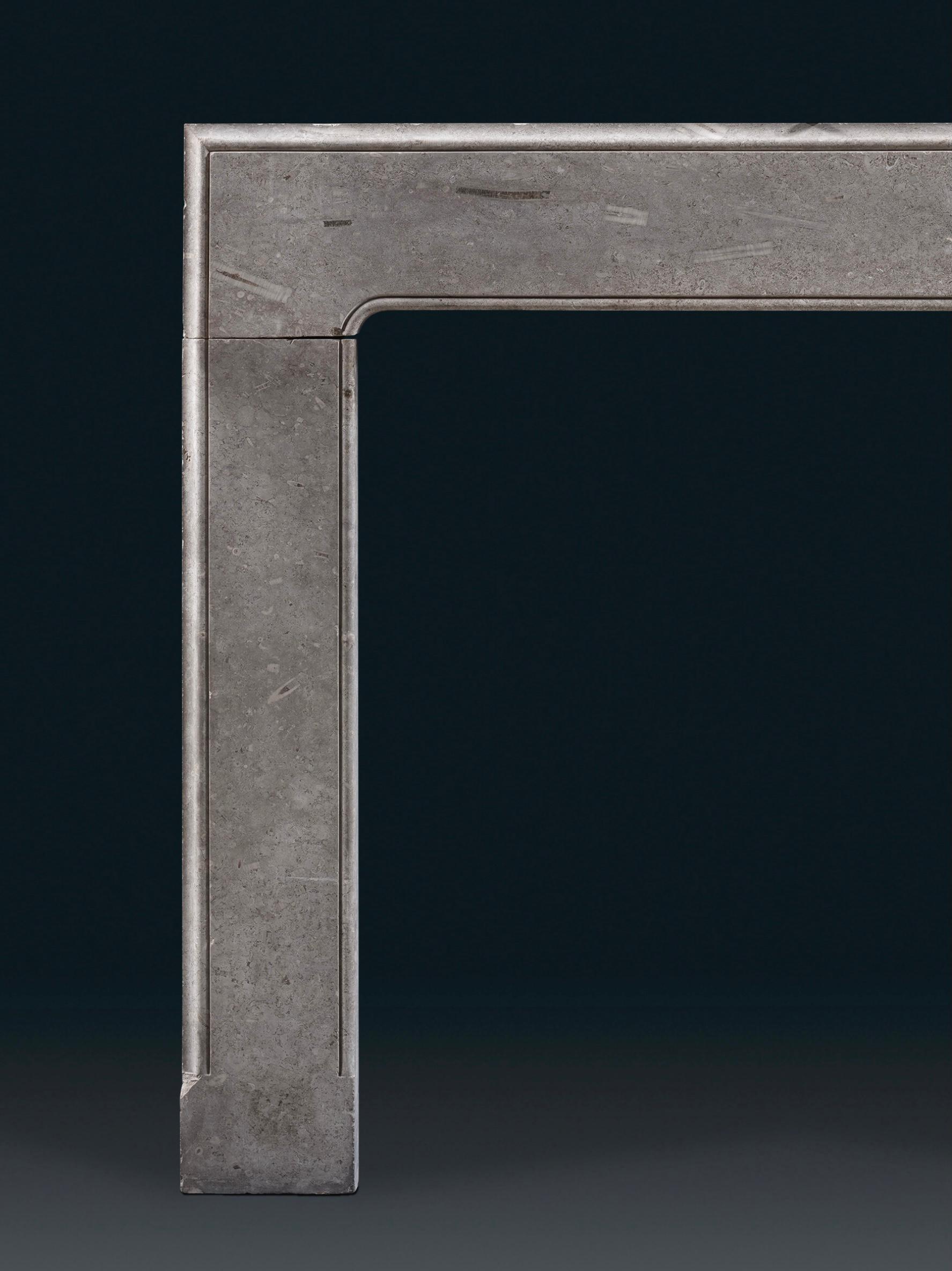 English A Refined George I Chimneypiece Carved in Swaledale Marble For Sale