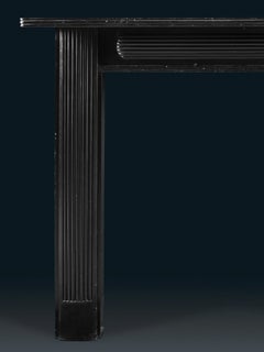 A Refined Irish Regency Chimneypiece in Black Kilkenny Marble