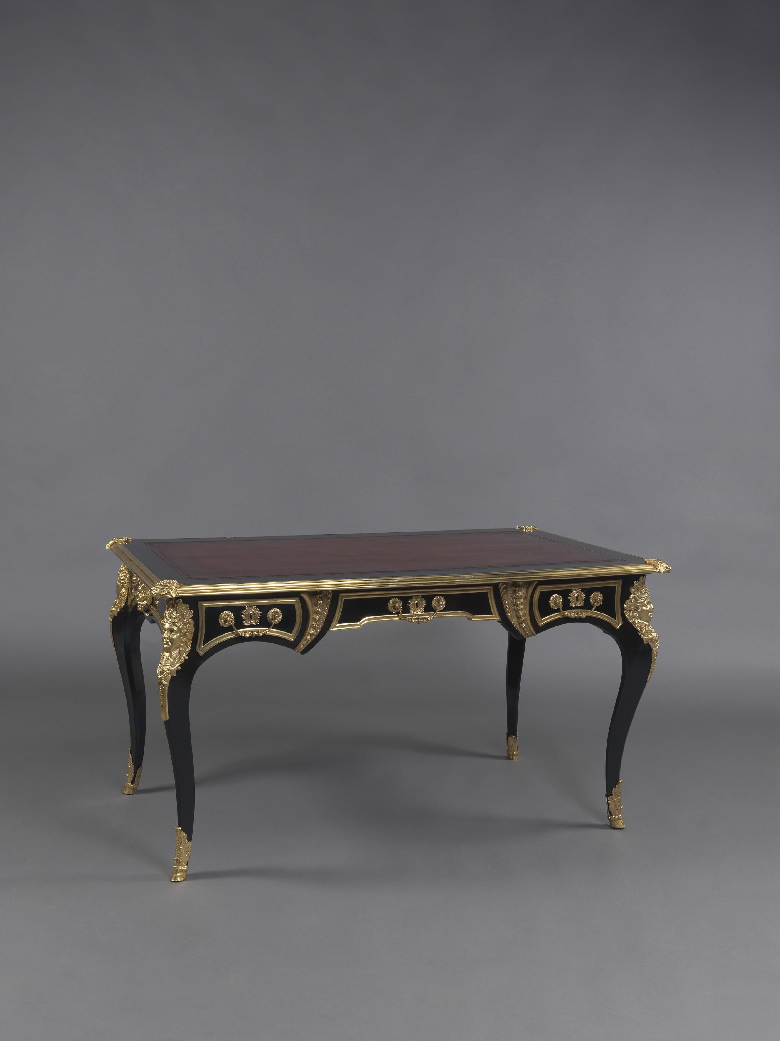 A fine Regence style ebonised and gilt-bronze mounted bureau plat by Sormani.

Paris, circa 1880.

The central drawer bearing a label for ‘VVE P. SORMANI & FILS 10, r. Charlot Paris’. 

Born in Venice in 1817, Paul Sormani (1817-1877), was a
