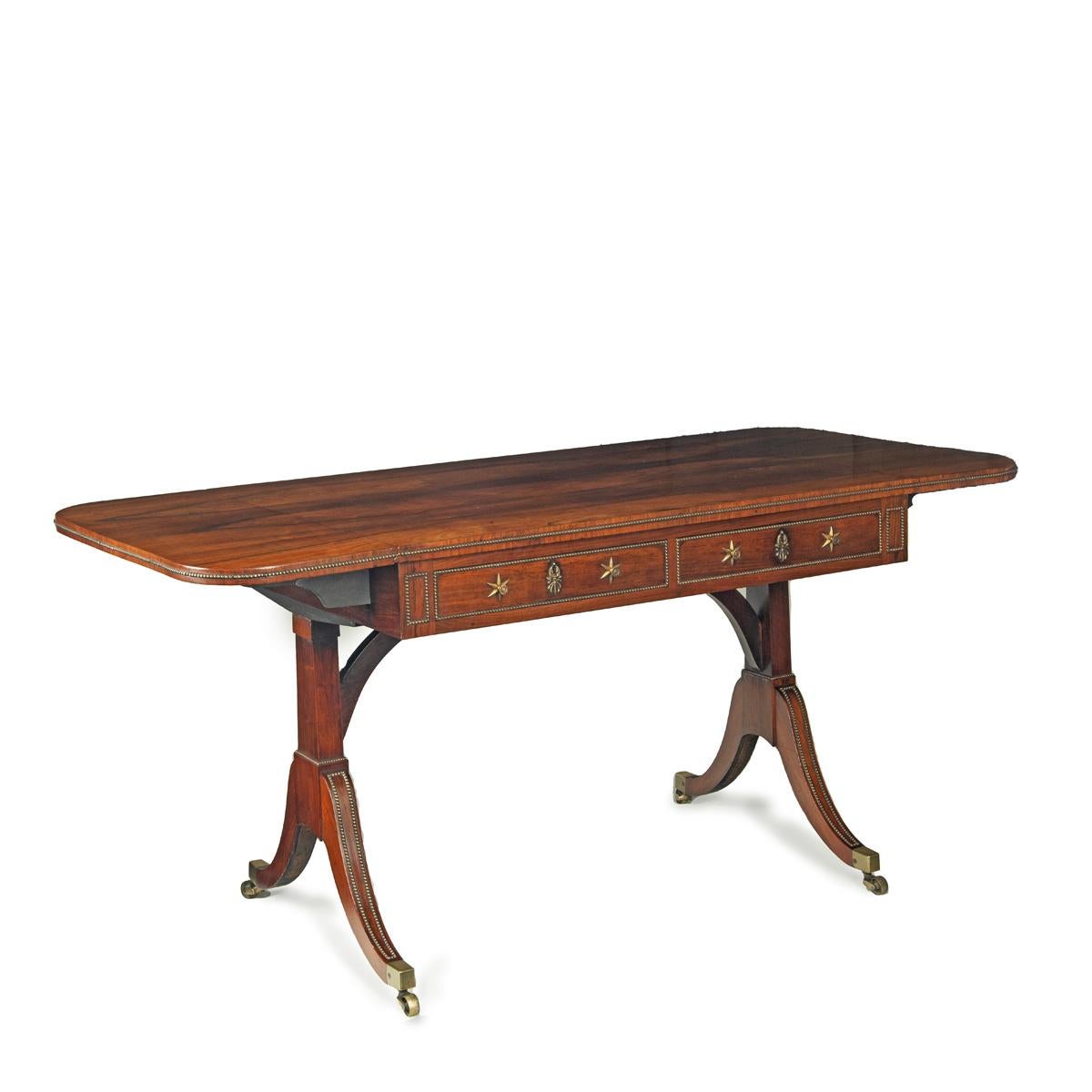 A Regency brass-inlaid rosewood sofa table attributed to Gillows For Sale 4