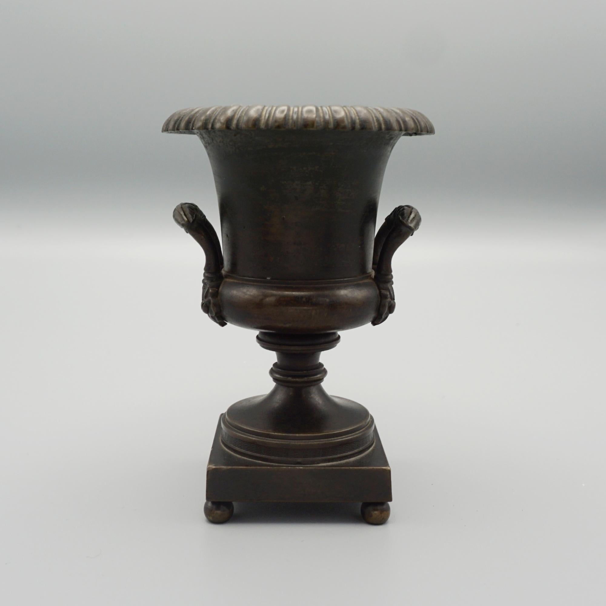 A Regency bronze incense burner in the form of an urn. 

Dimensions: H 12.5cm W 9cm D 9cm 

Origin: French

Date: Circa 1820