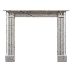 A Regency Bullseye Fireplace Carved from Old English Marble