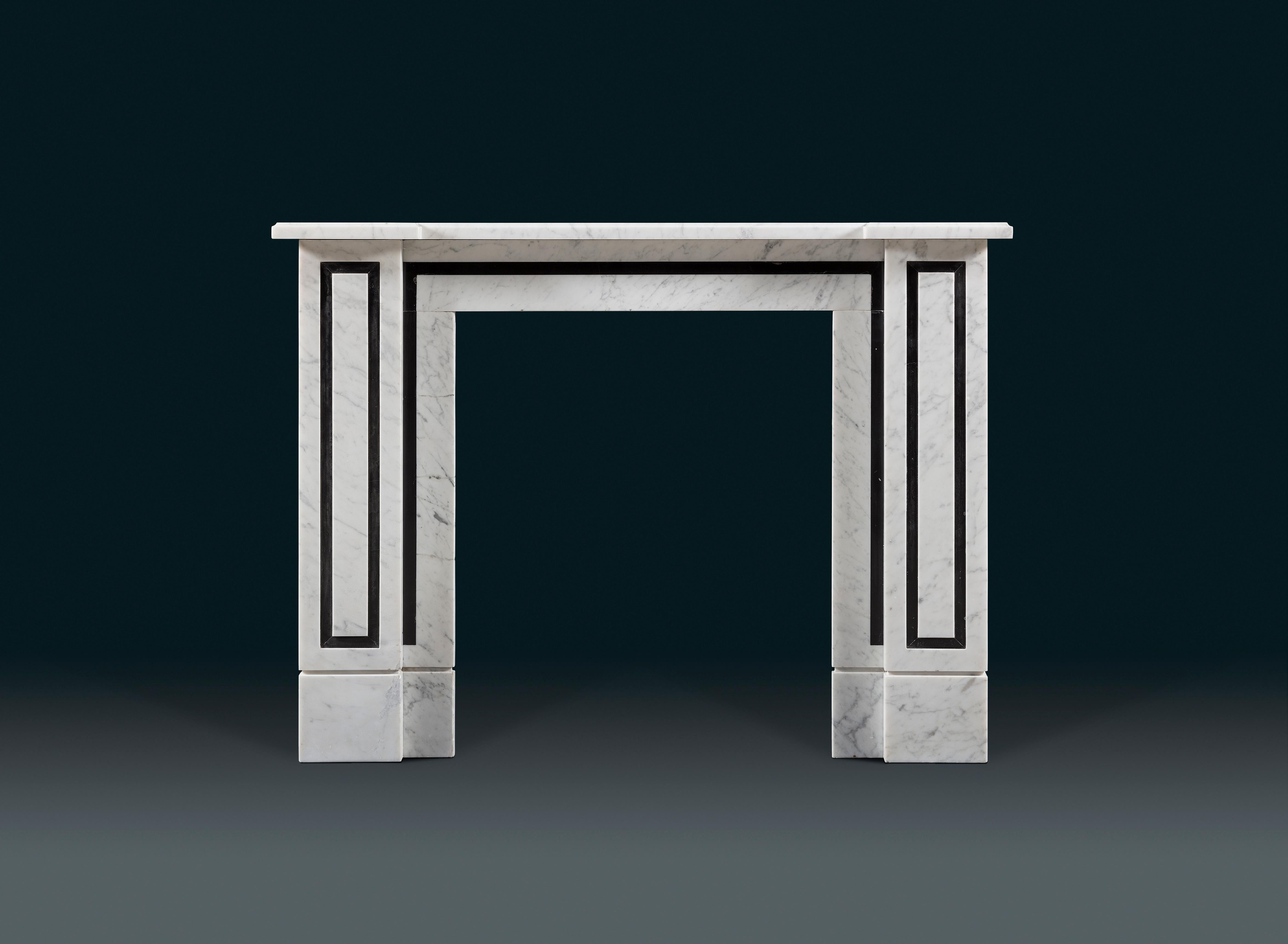 A Regency chimneypiece by Sir John Soane in Carrara marble and Welsh slate, originally from Pell Wall Hall in Market Drayton, Shropshire.
The overall proportions are of very unusual diminutive scale, indicative of a bedroom chimneypiece. Soane