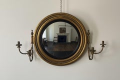 A Regency Giltwood Convex Mirror