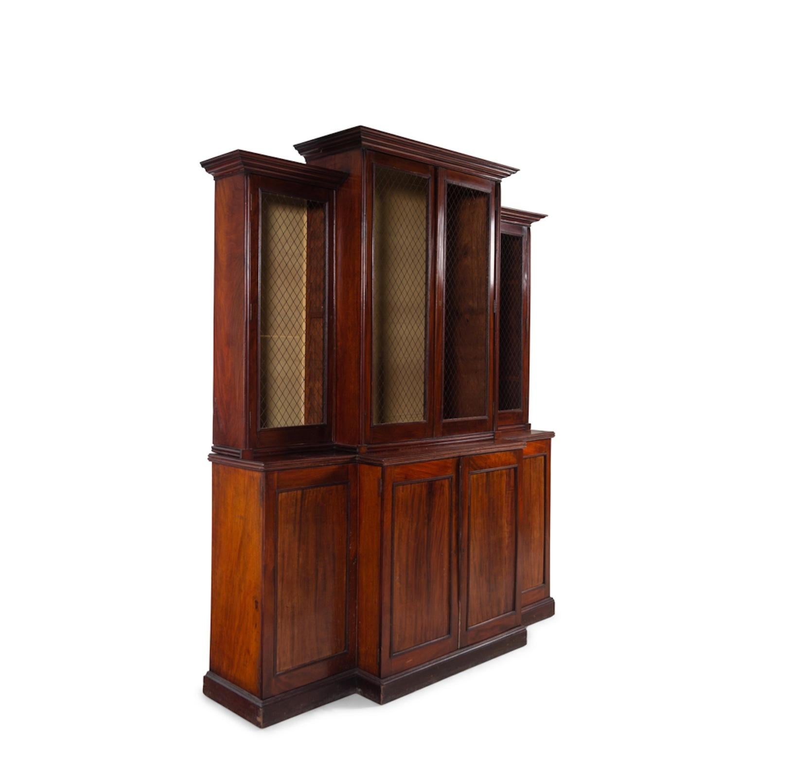 George III A Regency Mahogany Breakfront Bookcase 19th Century, Grilled Upper Doors. 1820 For Sale