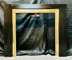 A Regency Manner Polished Brass Fireplace Frame.