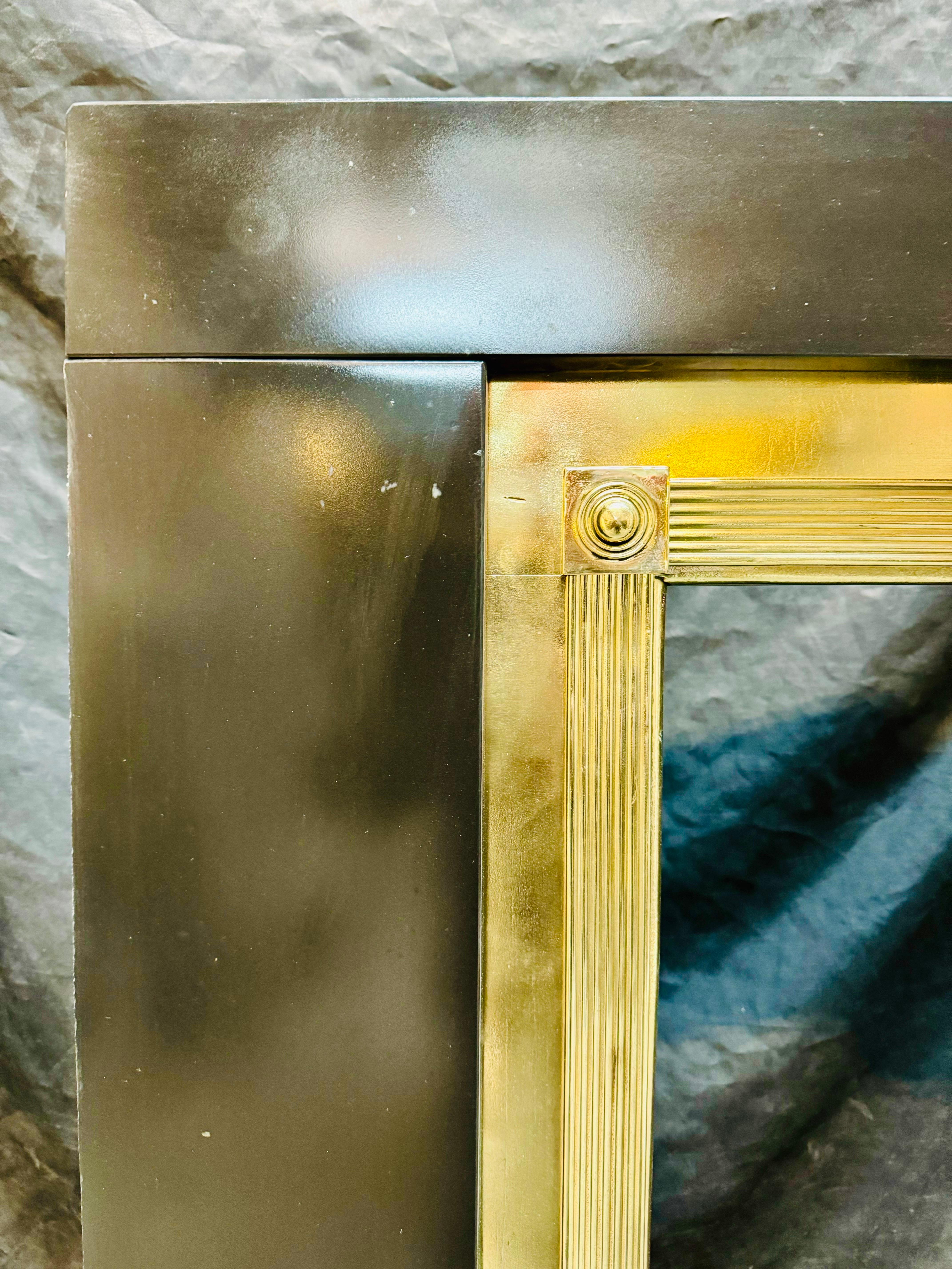 A Regency Manner Polished Brass Fireplace Frame. In Good Condition For Sale In Edinburgh, GB