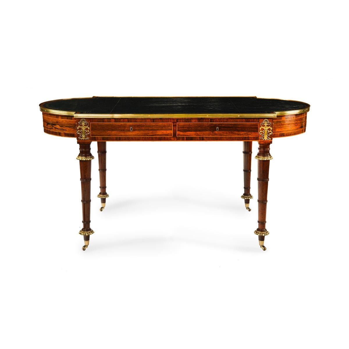 English A Regency ormolu mounted rosewood two drawer writing table