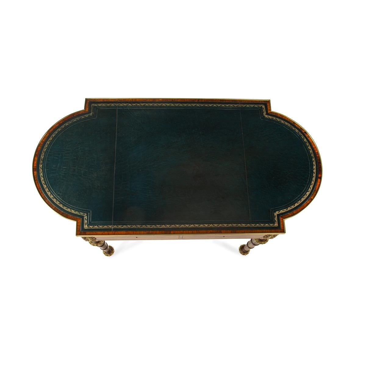 A Regency ormolu mounted rosewood two drawer writing table 1