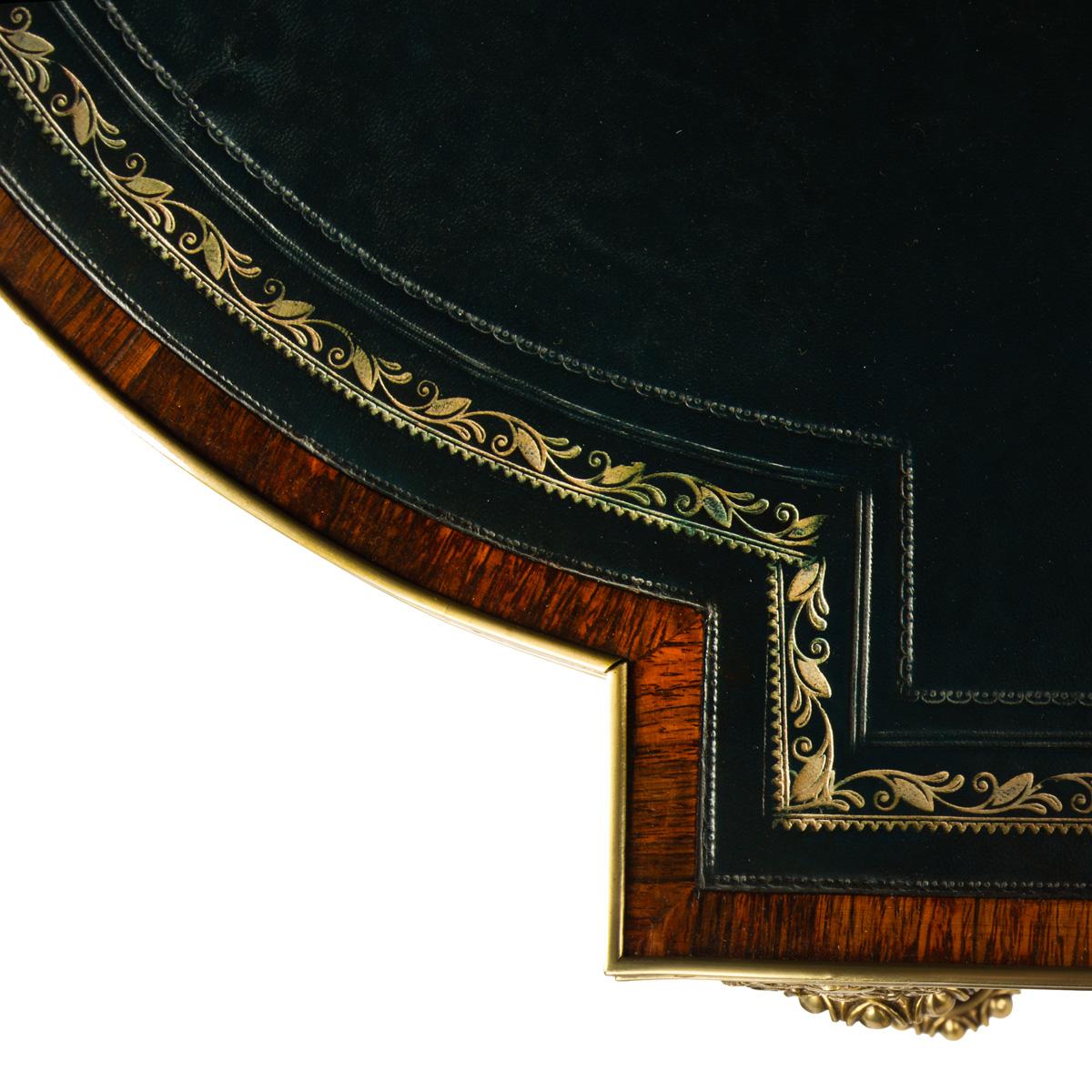A Regency ormolu mounted rosewood two drawer writing table 3