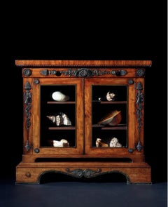 A regency period mahogany display cabinet