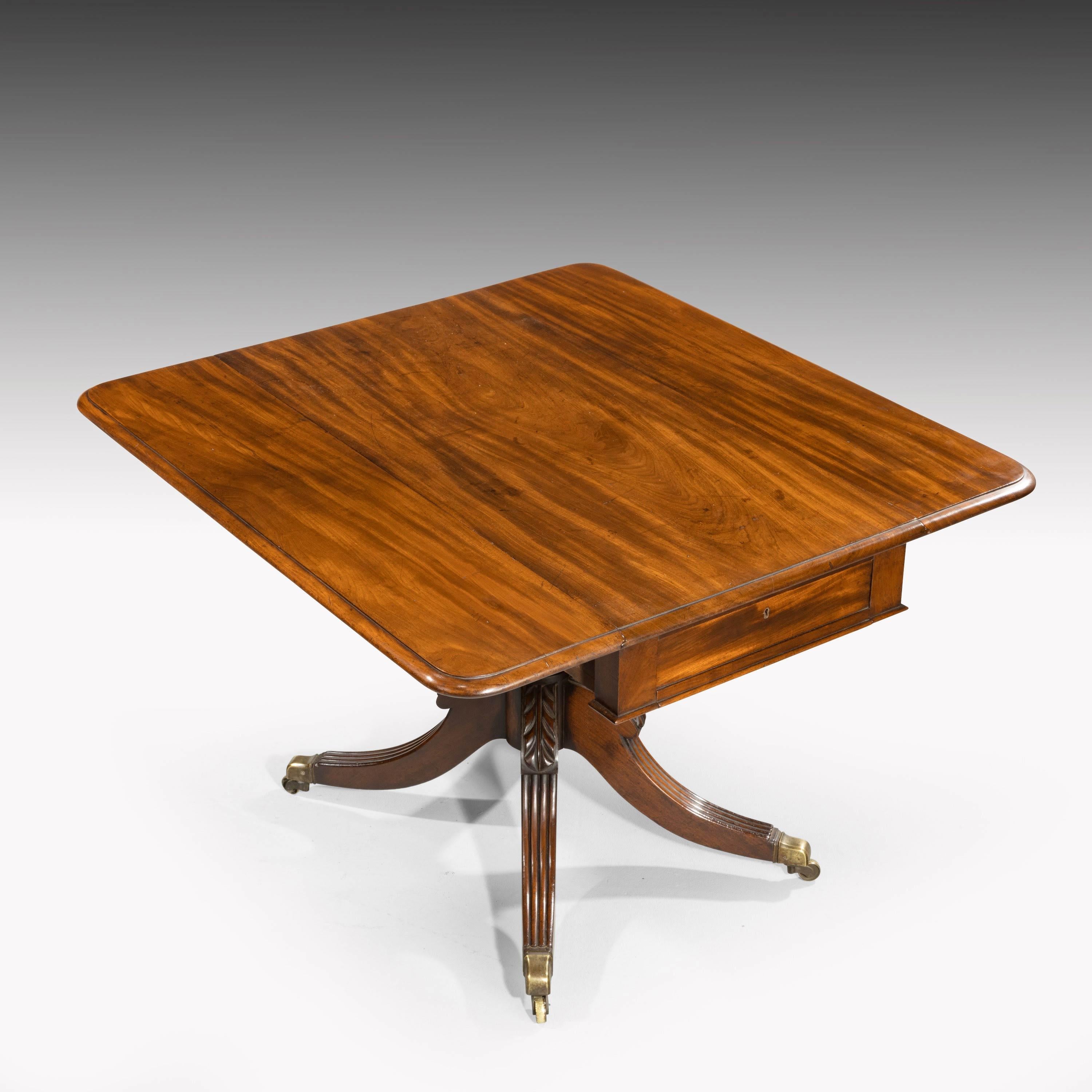 A Regency period mahogany Pembroke table on a well turned centre support. With reeded legs. Retains the original shoes and castors. Excellent overall color and condition.
Closed width is 20.5 inches.