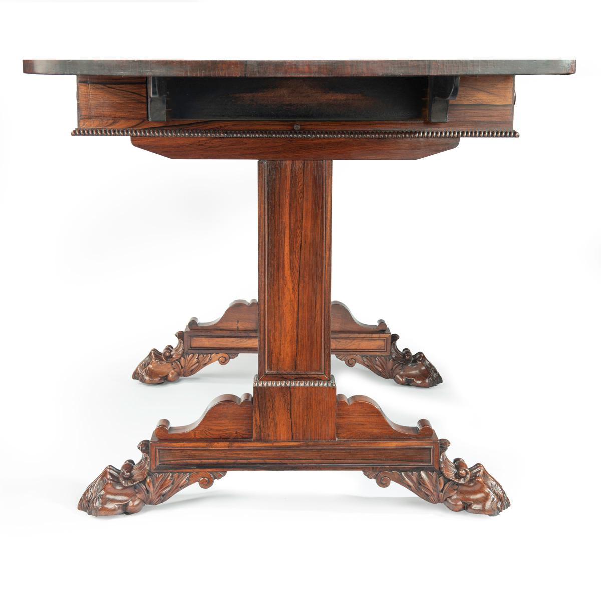 Early 19th Century A Regency rosewood end support sofa table, attributed to Gillows For Sale