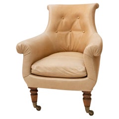Poltrona Bergere in pelle beige e mogano in stile Regency