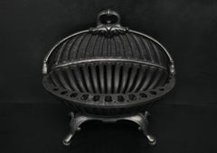 A Regency Style Cast Iron Firegrate