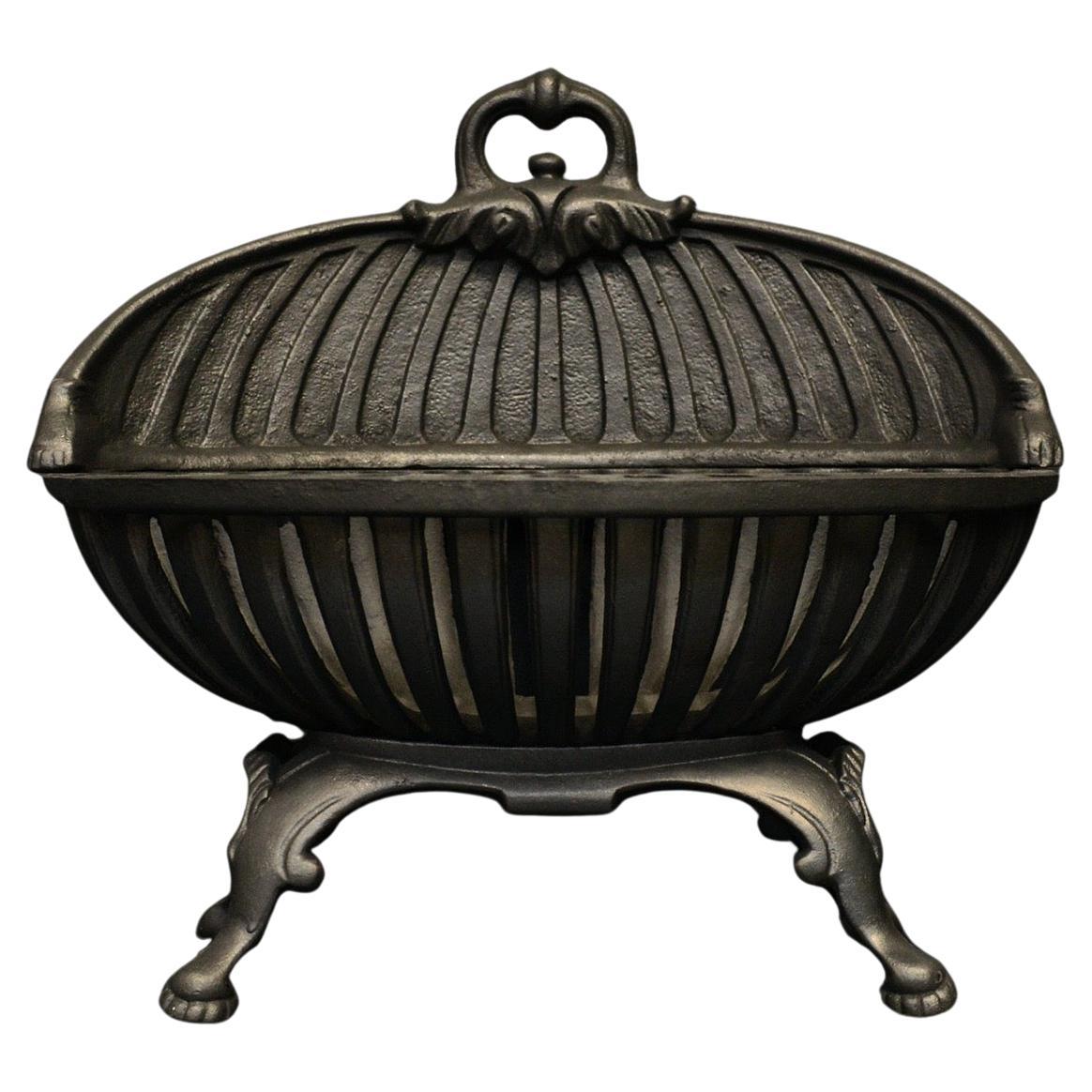 A Regency Style Cast Iron Firegrate