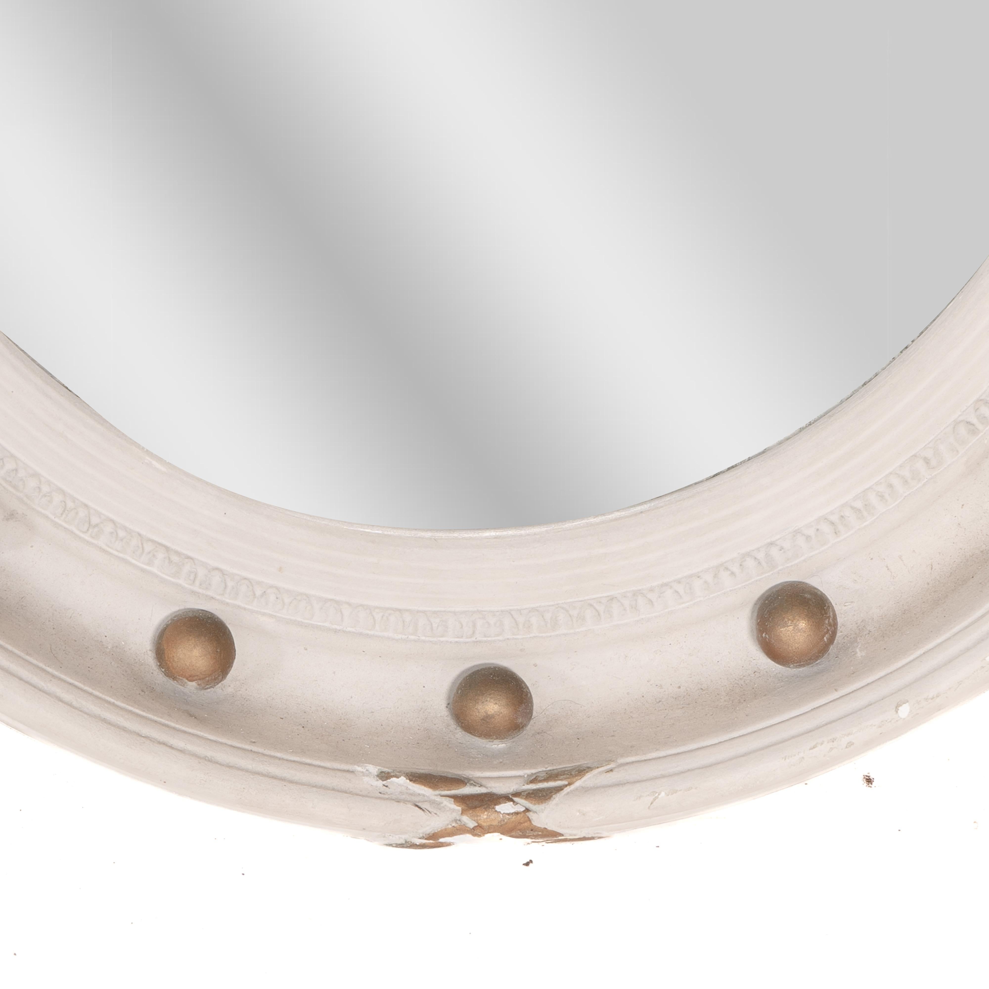A Regency style circular convex mirror with ball and ribbon decoration For Sale 4