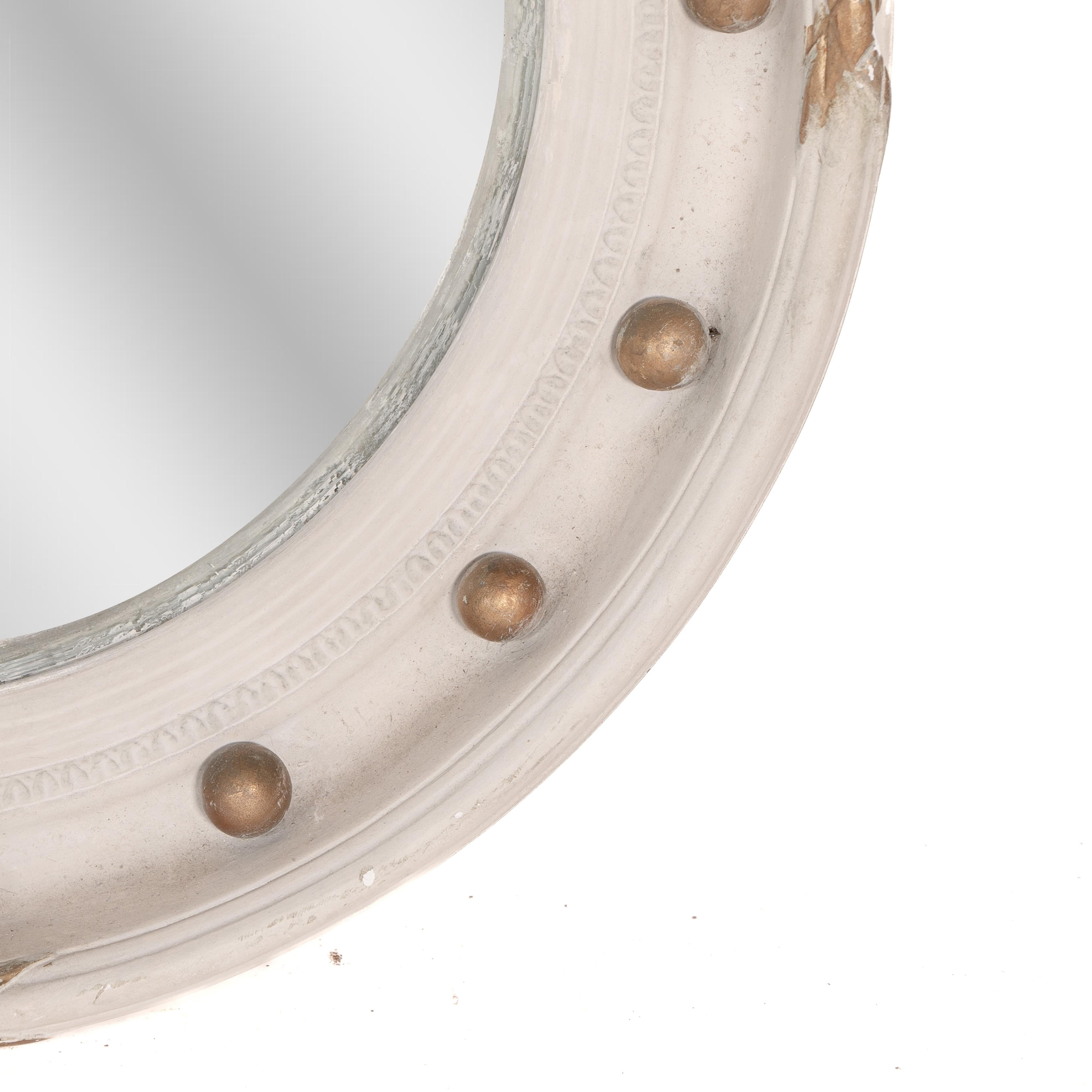 A Regency style circular convex mirror with ball and ribbon decoration For Sale 5