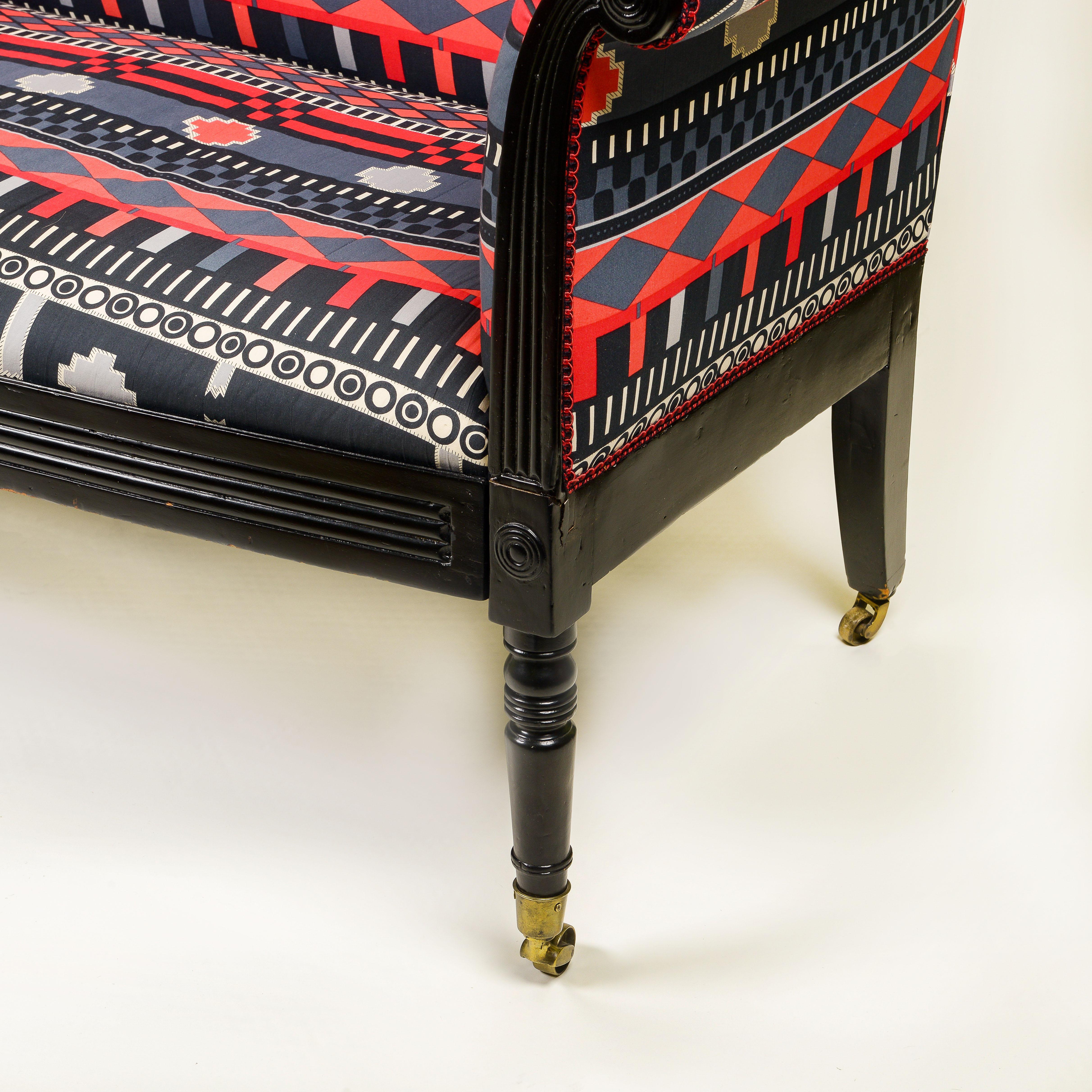 Brass A Regency Style Ebonised and Upholstered Settee For Sale
