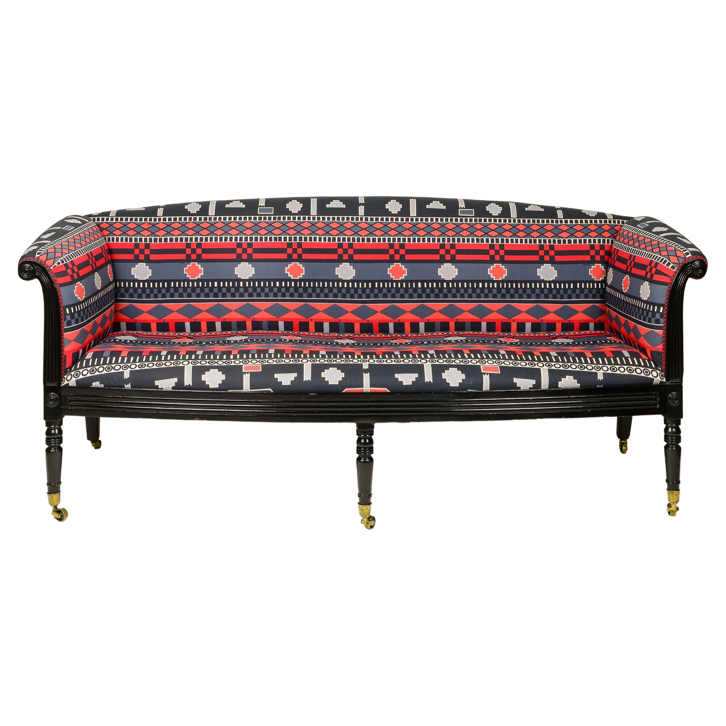 A Regency Style Ebonised and Upholstered Settee For Sale