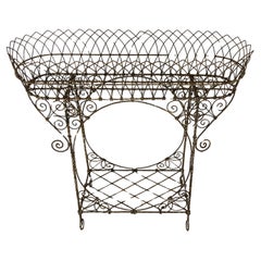 A Regency Wire Work Plant Stand  The planter has an upper basket
