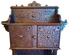 A Renaissance Revival Carved Wooden Wall Cabinet