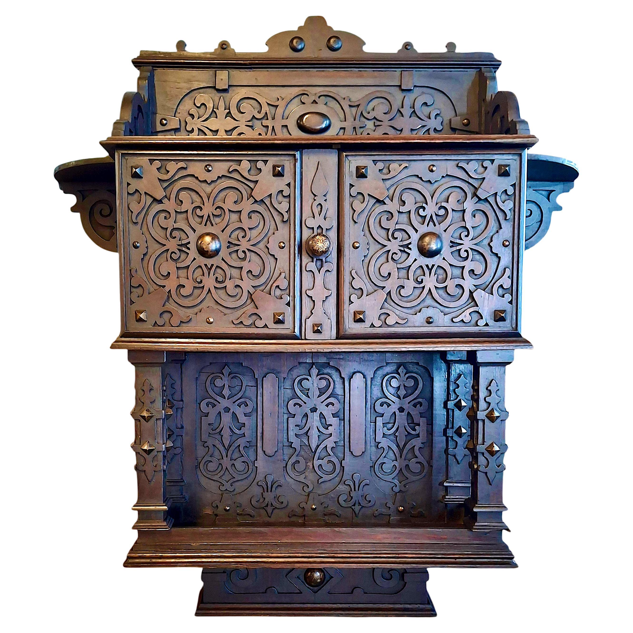 A Renaissance Revival Carved Wooden Wall Cabinet For Sale