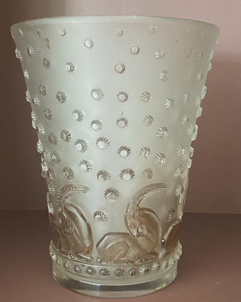  R.Lalique named the Ajaccio  vase after the name of the capital of Corsica.

The vase is still strongly influenced by the late Art Deco period and  but shows signs  of the futur 1940tys design which will  soon  out date the Art Deco style 

The