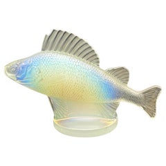 Used A Rene lalique Perch car Mascot in opalescent glass