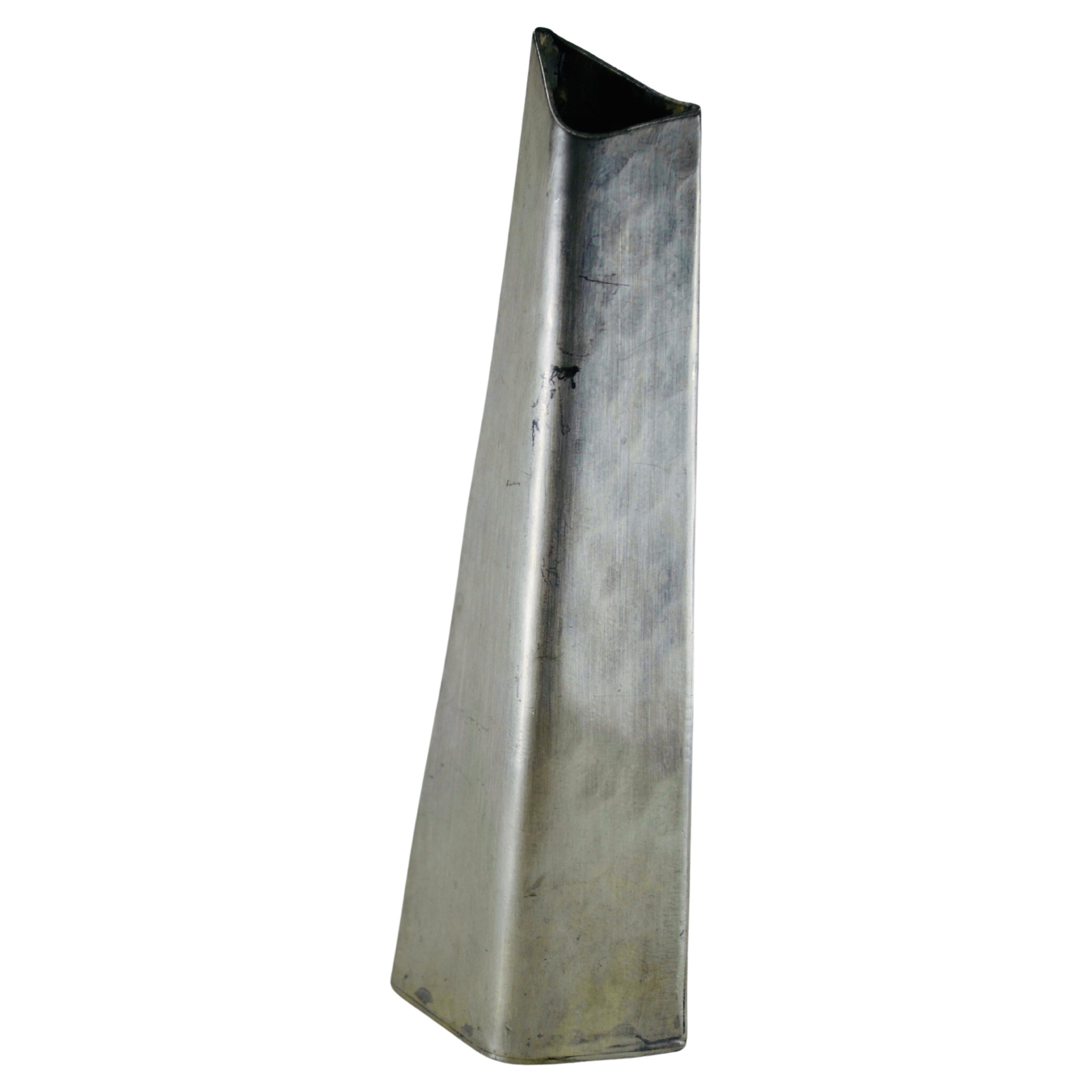 A repoussé stainless steel vase France 1970 For Sale