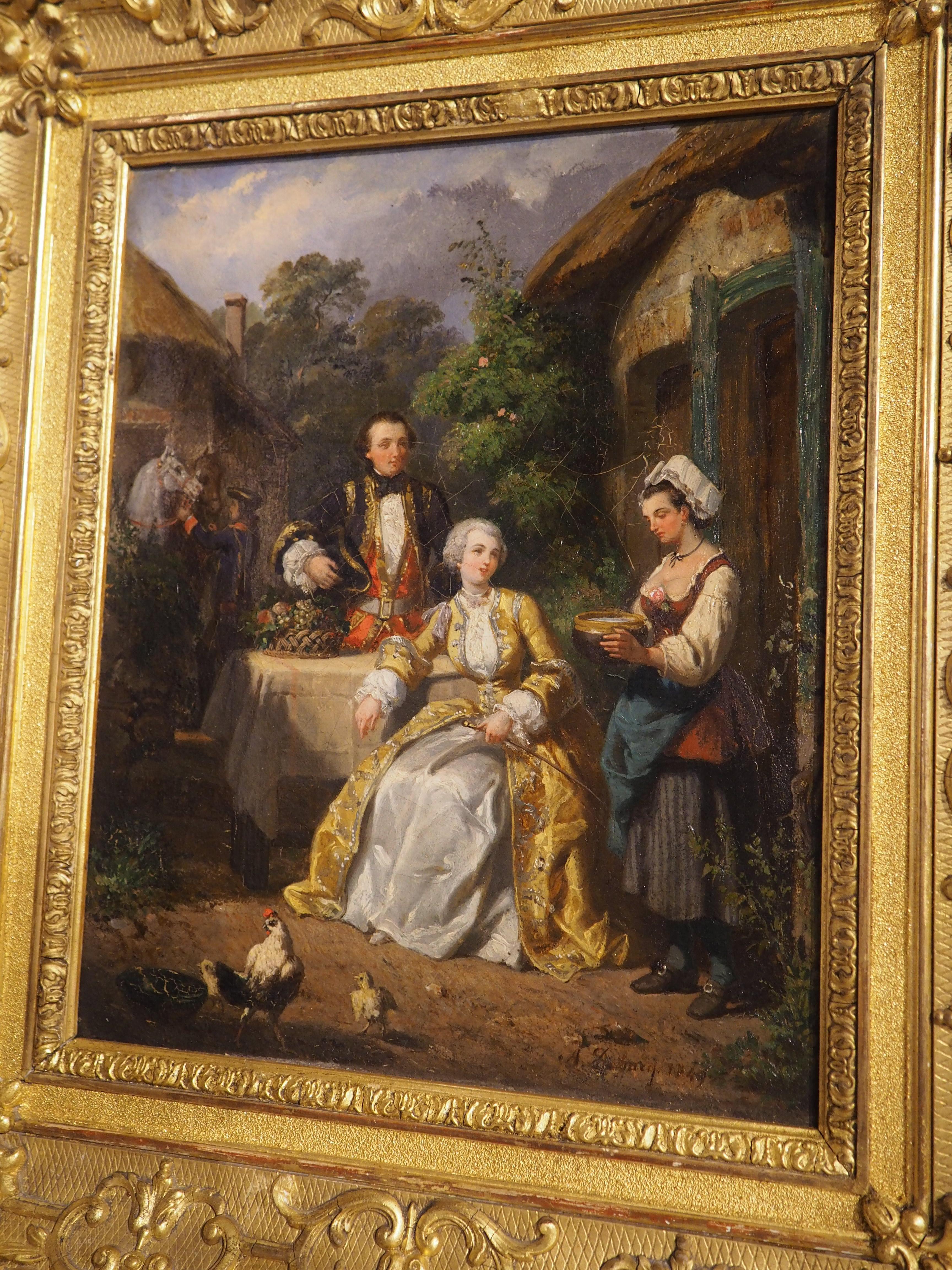 Signed and dated “A. DeBacq 1849” (Charles-Alexandre DeBacq), this charming oil on canvas painting portrays a French noble couple enjoying a snack in the courtyard after an afternoon horseback ride. Surrounded by a highly-carved giltwood frame