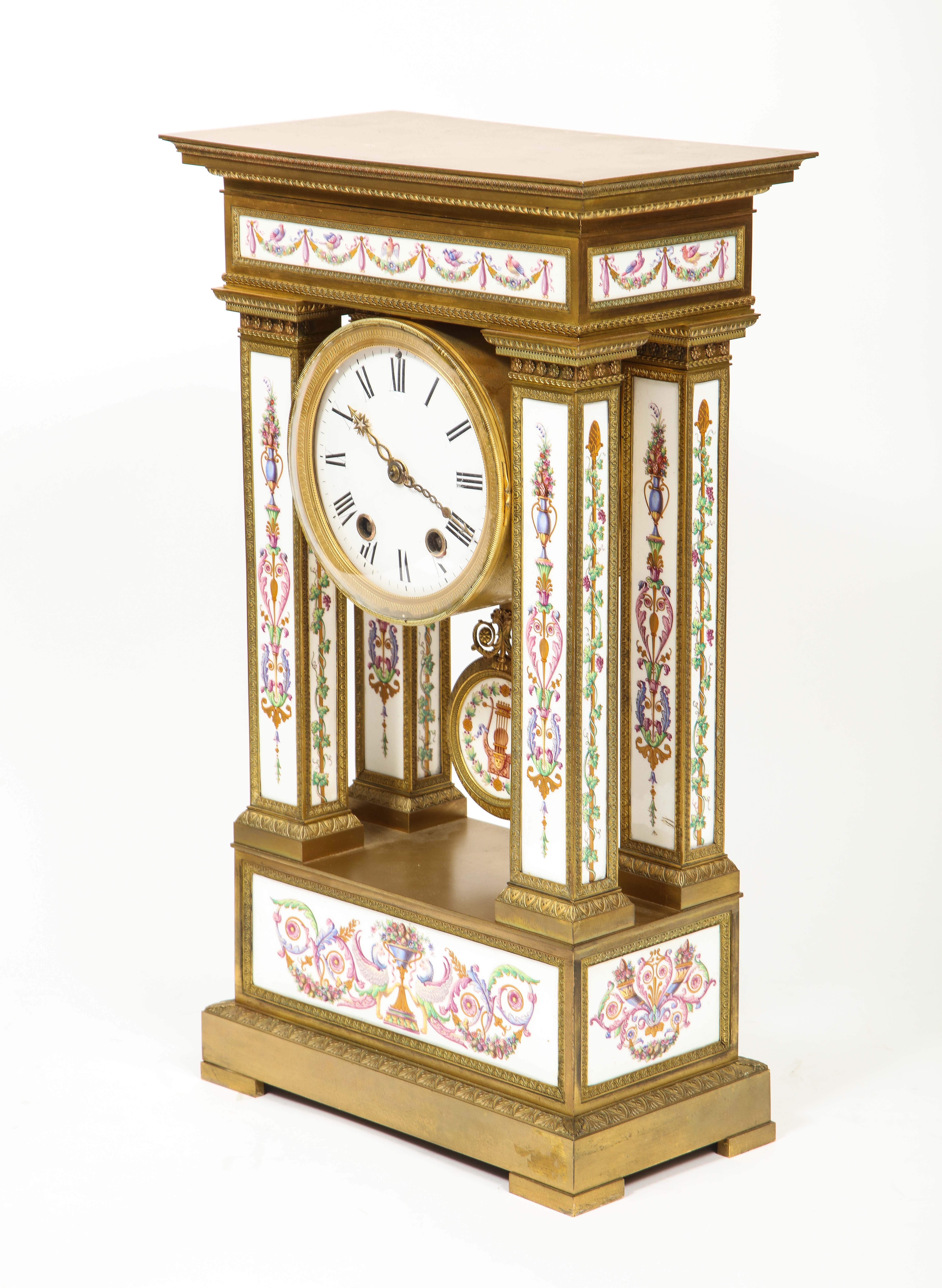 A Restauration Period Porcelain Inset Ormolu Mantel Clock, Attributed to Deniere For Sale 6