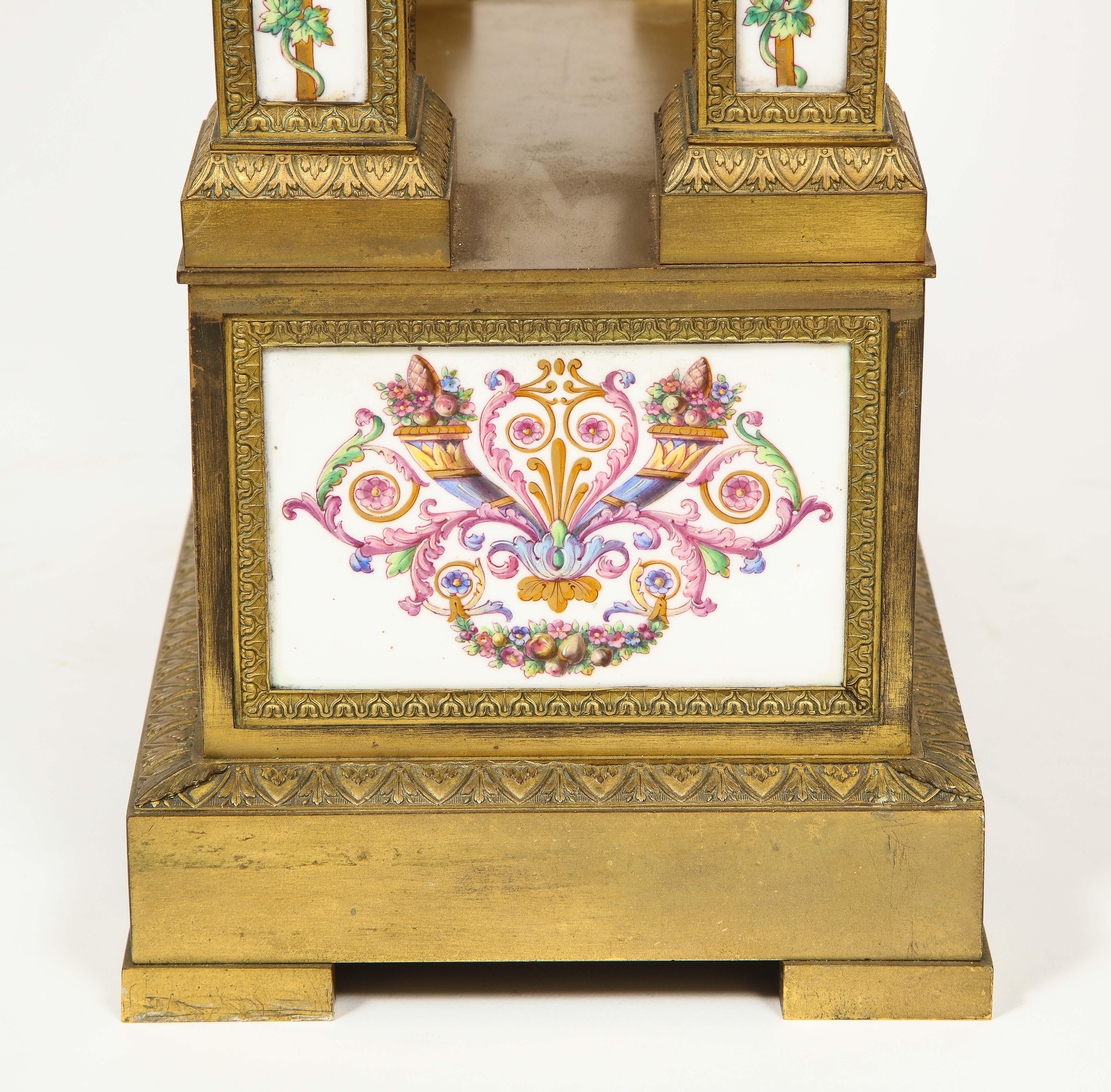 A Restauration Period Porcelain Inset Ormolu Mantel Clock, Attributed to Deniere For Sale 8