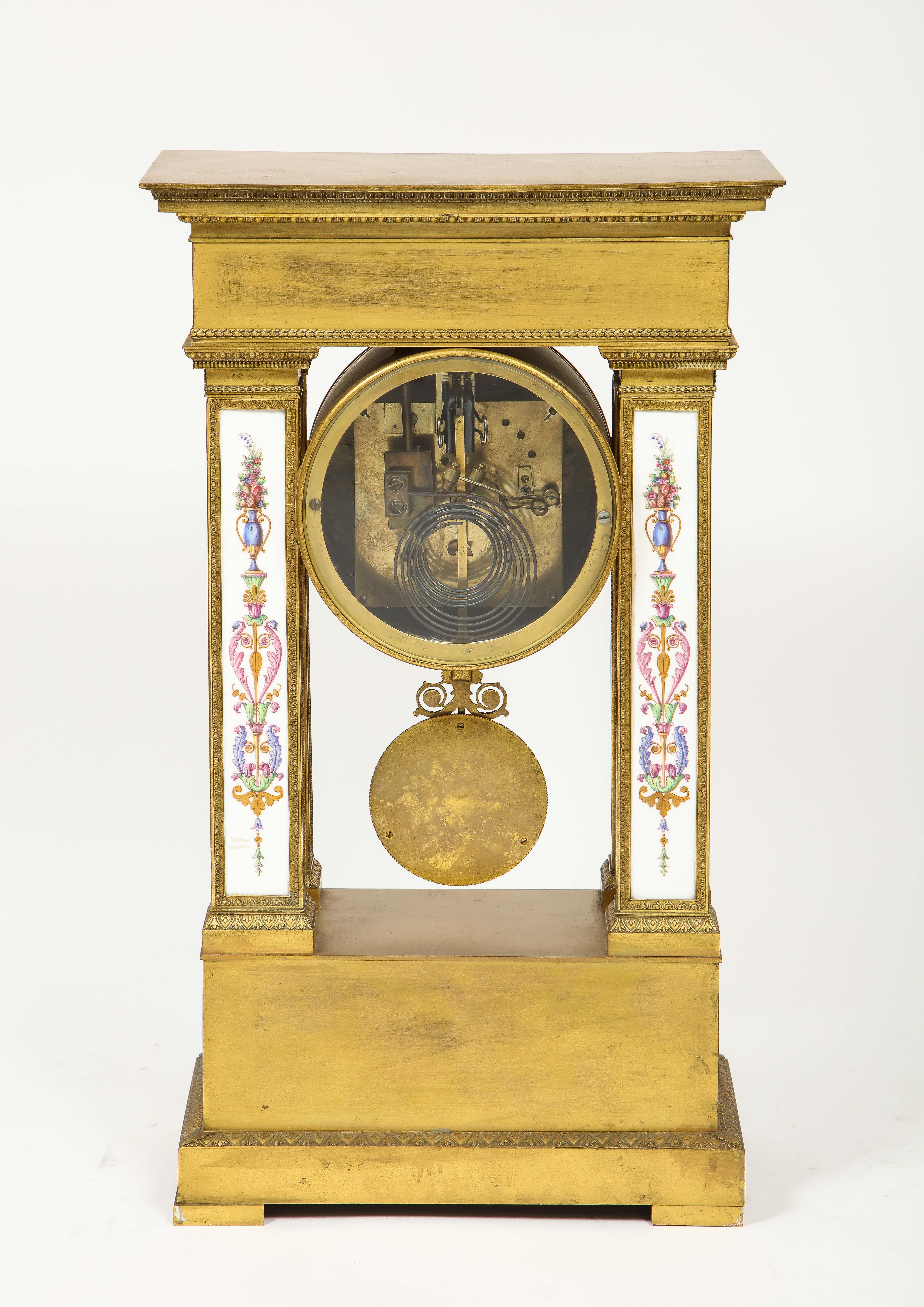 A Restauration Period Porcelain Inset Ormolu Mantel Clock, Attributed to Deniere For Sale 10