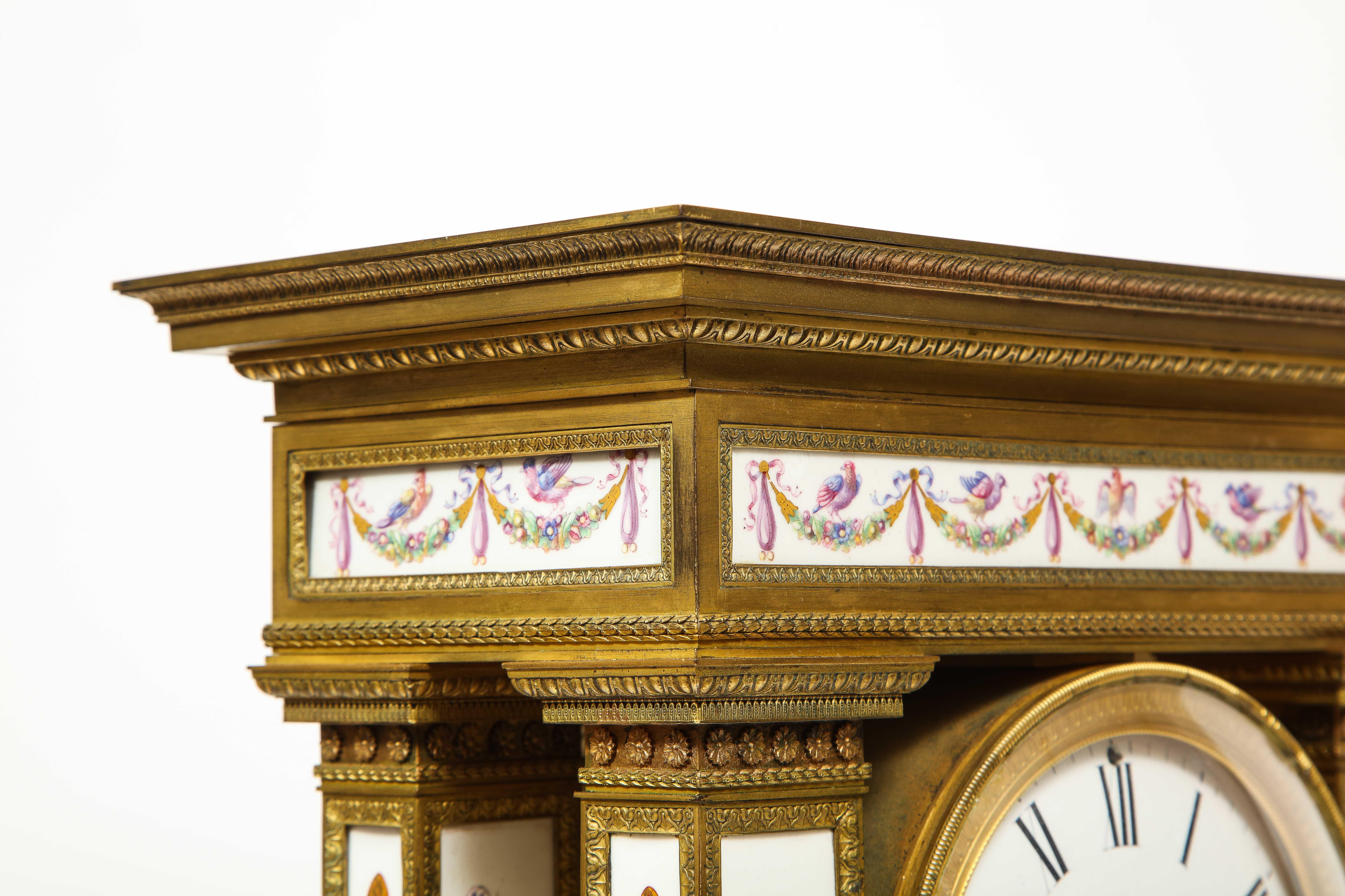 A Restauration Period Porcelain Inset Ormolu Mantel Clock, Attributed to Deniere For Sale 12