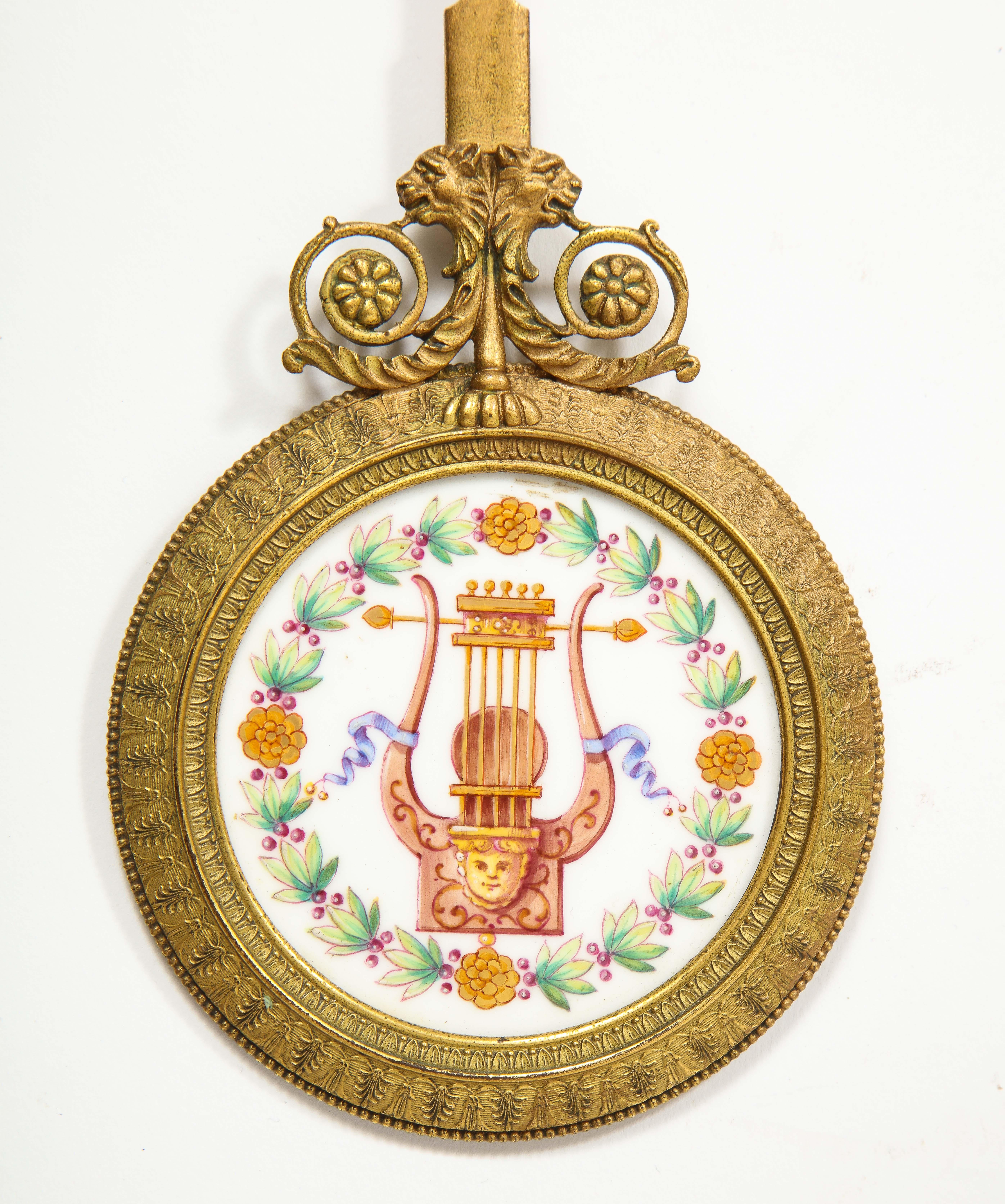A Restauration Period Porcelain Inset Ormolu Mantel Clock, Attributed to Deniere For Sale 13