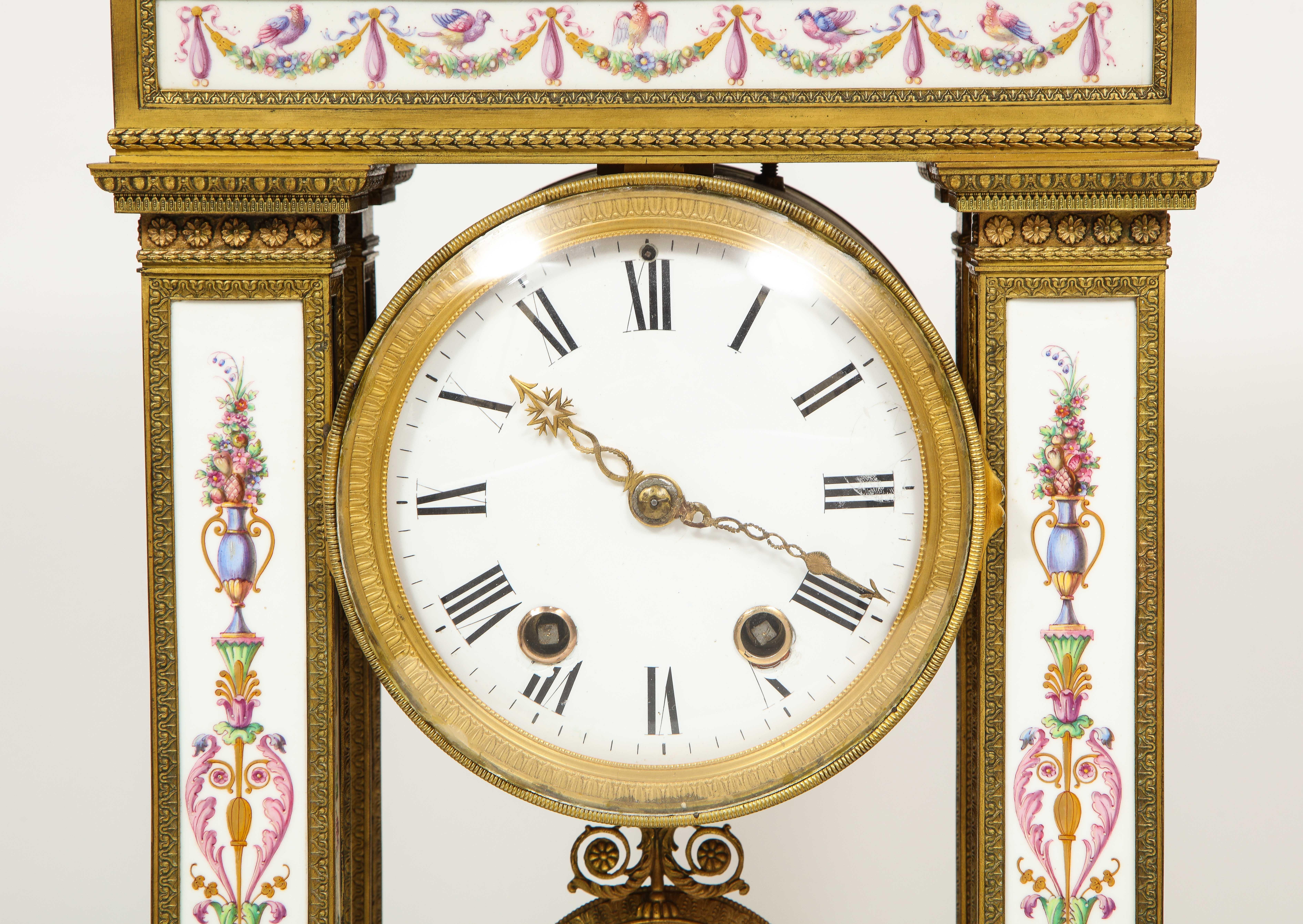 A Restauration Period Porcelain Inset Ormolu Mantel Clock, Attributed to Deniere In Good Condition For Sale In Queens, NY