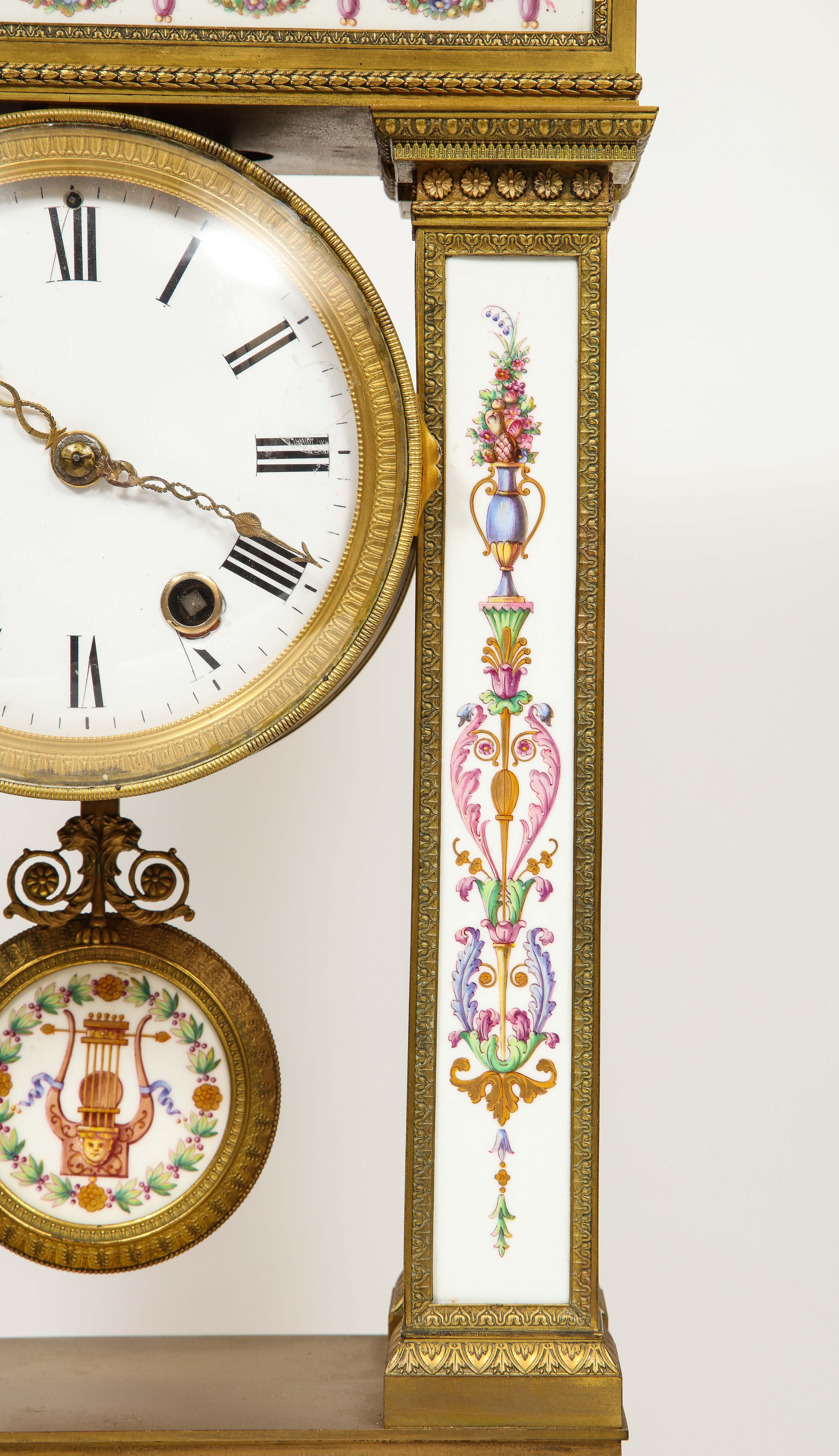 A Restauration Period Porcelain Inset Ormolu Mantel Clock, Attributed to Deniere For Sale 1