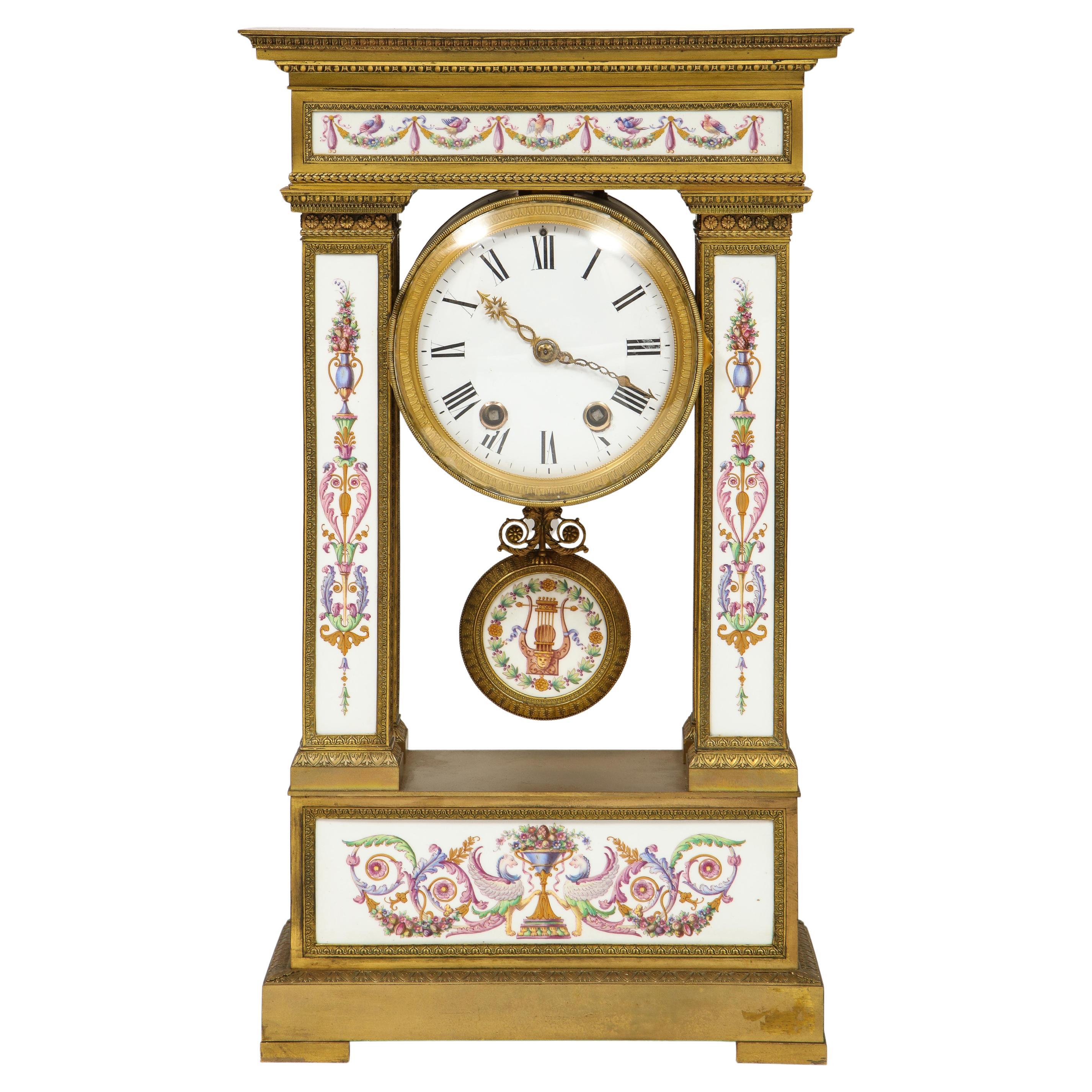 A Restauration Period Porcelain Inset Ormolu Mantel Clock, Attributed to Deniere For Sale