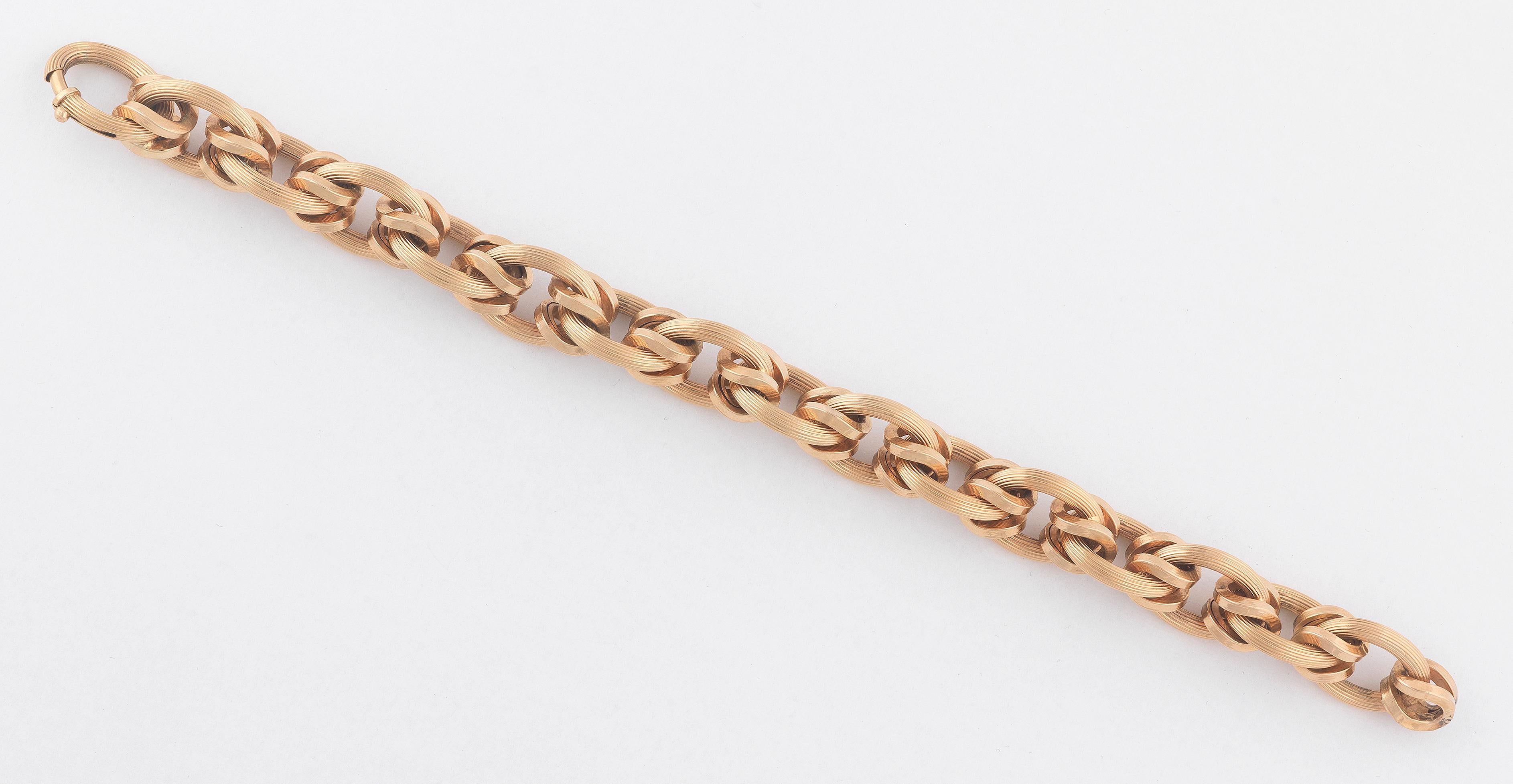 composed of the rope-motif strands, gross weight approximately 77.4 grams; length: 19cm.