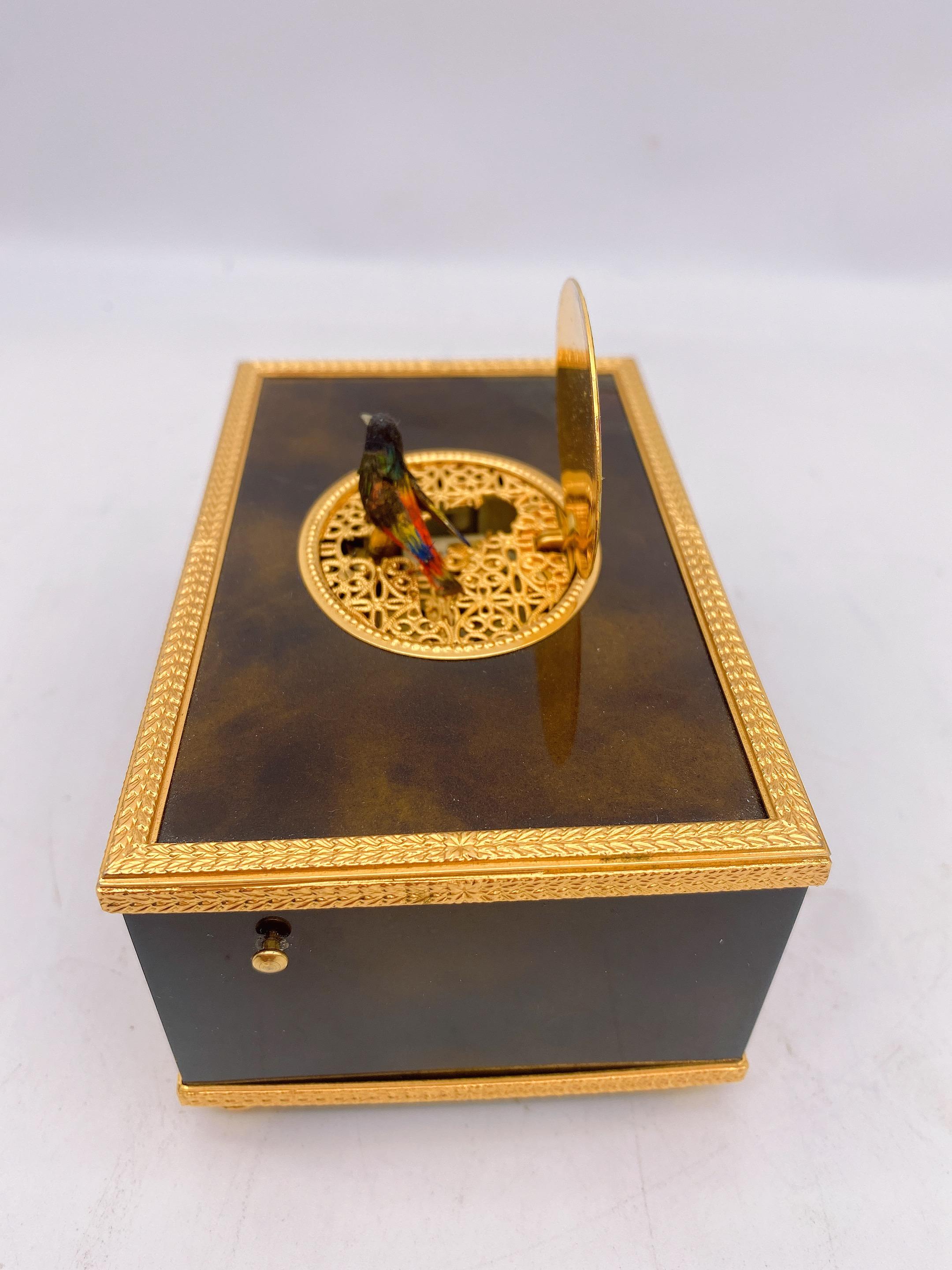 music box with bird inside