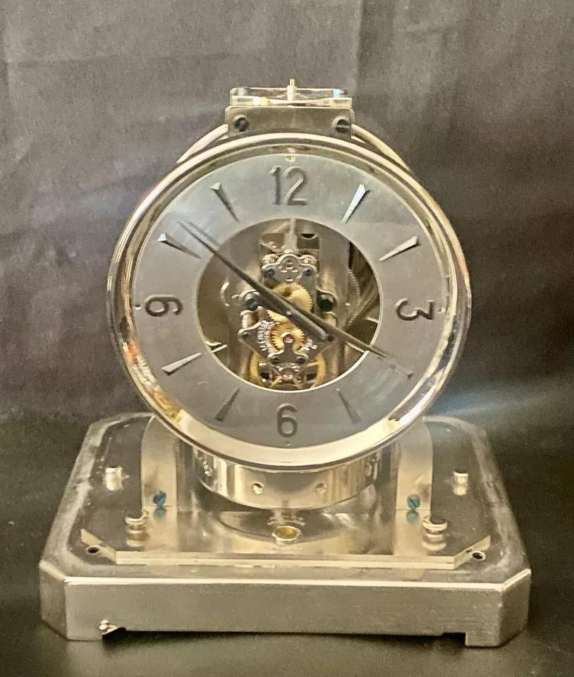 A Rare 519 Cal Rhodium Plated 1950's Jaeger Le Coultre Bell-Jar Model Swiss Atmos Clock With A Silvered Dial,  
Made circa 1950 Size: 10 “ x  9” x  7”. by Le Coutre, this atmos clock model stands out with its early serial number 30657.
The clock is