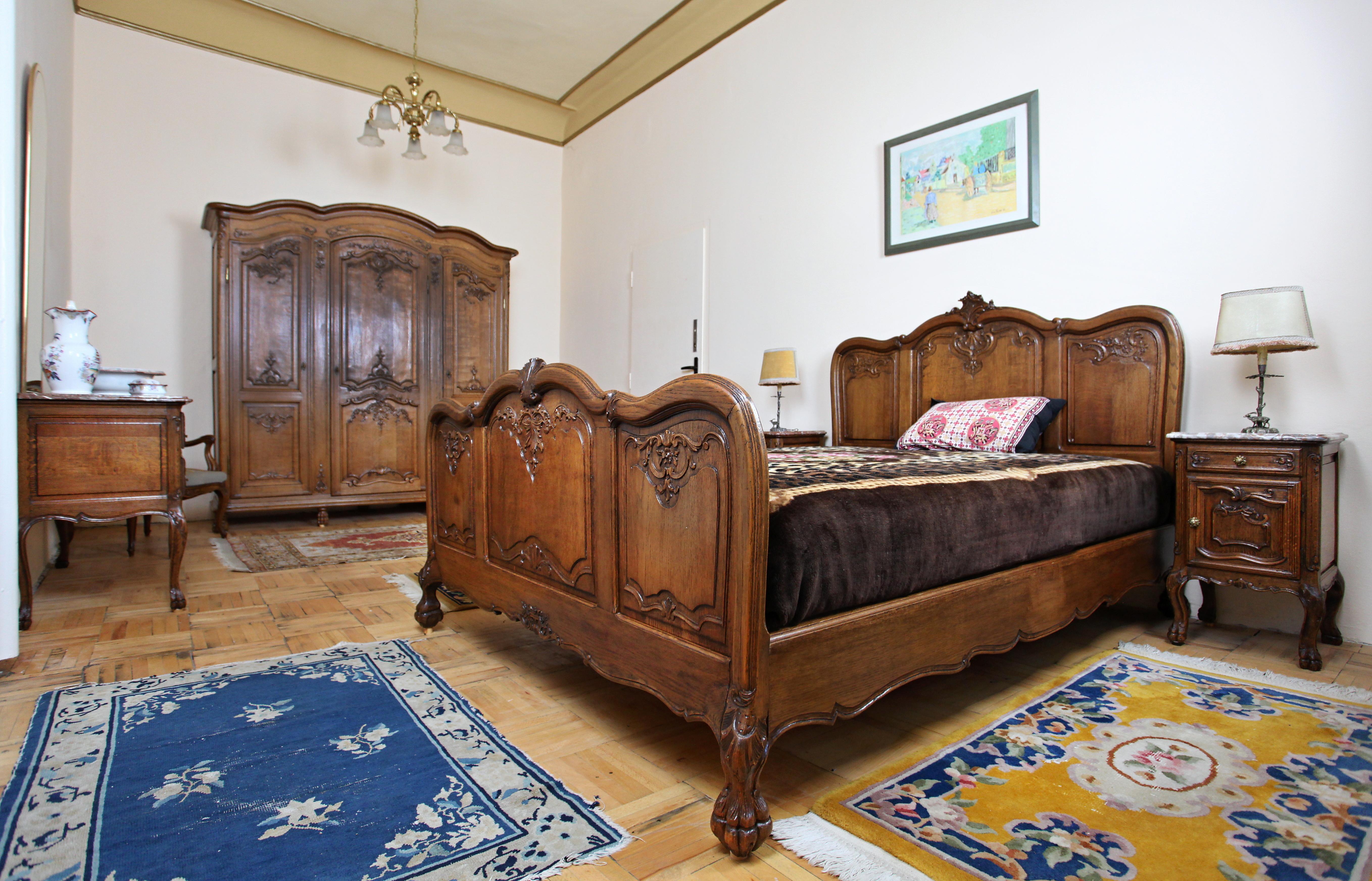 A richly carved antique bedroom. Solid oak

A bedroom from the end of the 19th century decorated with rich carvings in the Rococo style. A beautiful bedroom in excellent quality both in terms of craftsmanship and material. Hand carvings are very