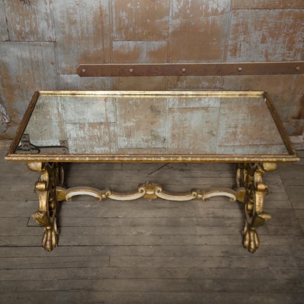 Richly Carved Mirror Top Giltwood Coffee Table, French, nineteenth century. In Good Condition In Philadelphia, PA