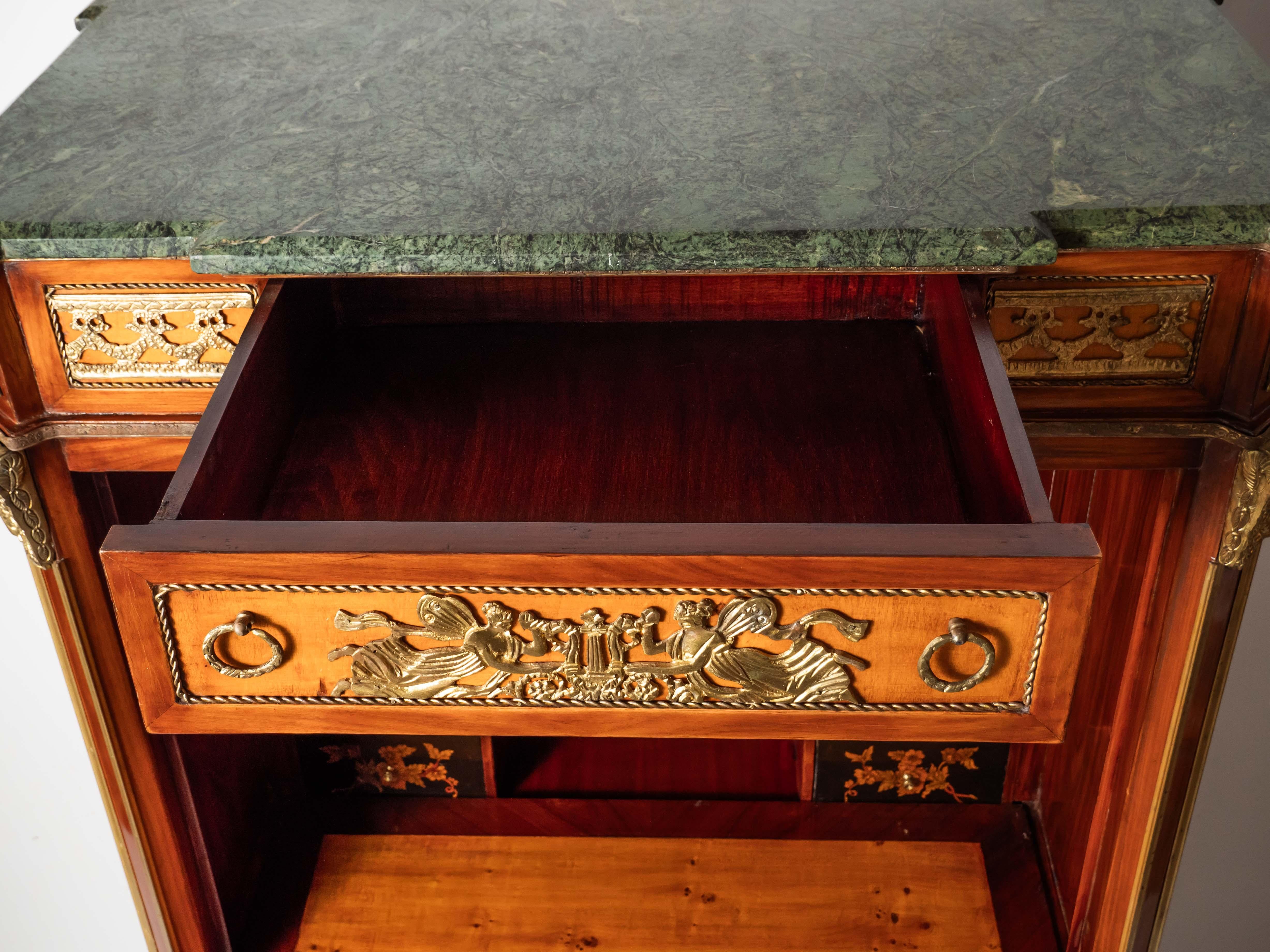 A richly decorated neoclassical secretary For Sale at 1stDibs