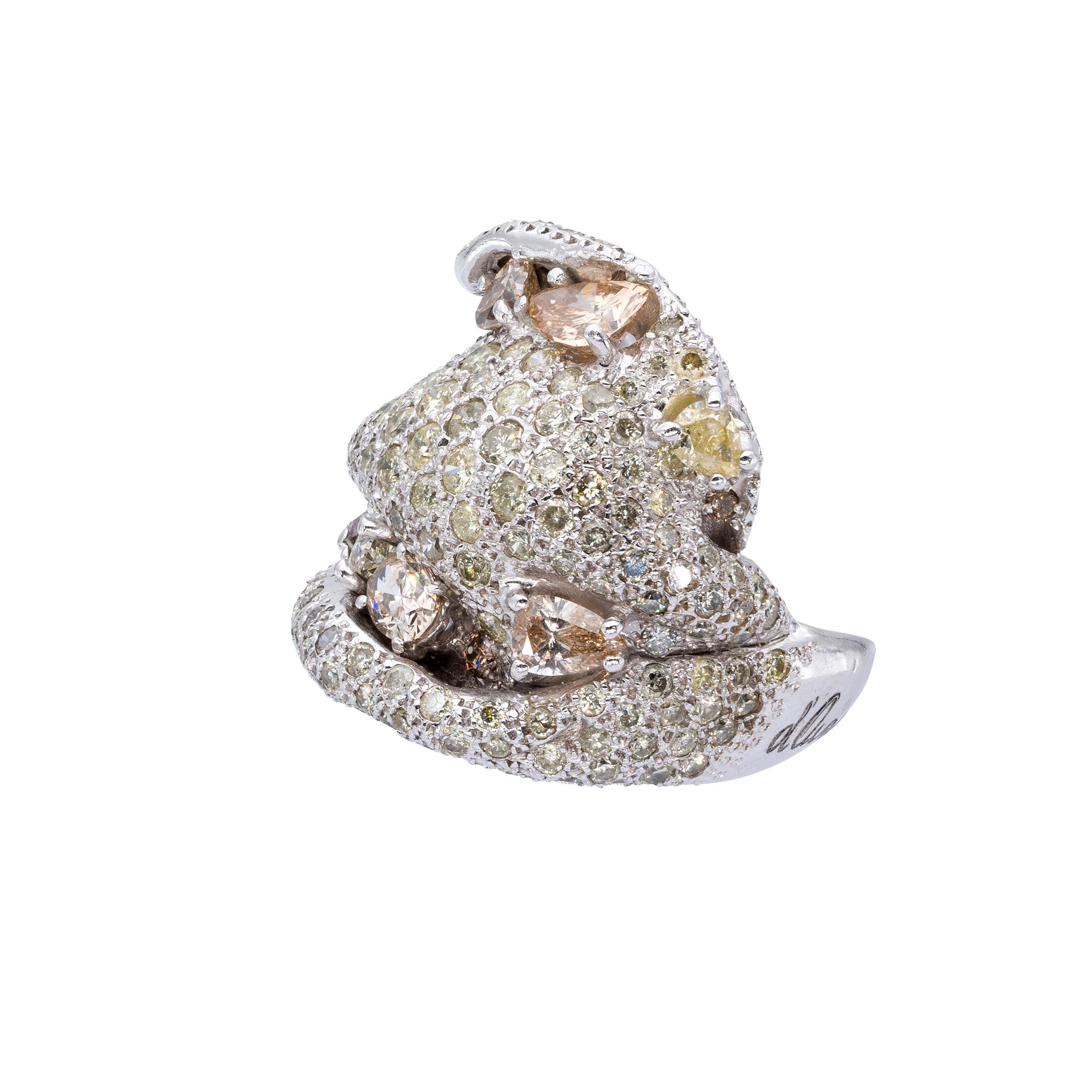 A Ring from d'Avossa Masterpiece Rings Collection in yellow 18 kt gold with a pavé of 0.55 cts of white diamonds and a central fancy natural oval shape diamond of 0.34 cts. 

Ref. Number ABT659

