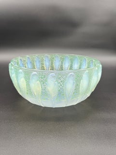 a R.Lalique Art Déco Perruches Bowl in opalescent Glass.