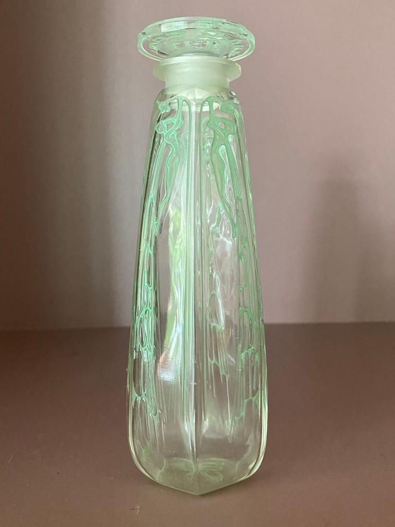 Il flacone di profumo Cyclamen è stato uno dei primissimi realizzati da R.Lalique per i profumi Coty.

È fortemente influenzato dallo stile Art Nouveau e da R&R ART. Lalique ha duplicato l'ispirazione dei suoi gioiellieri nella sua produzione di