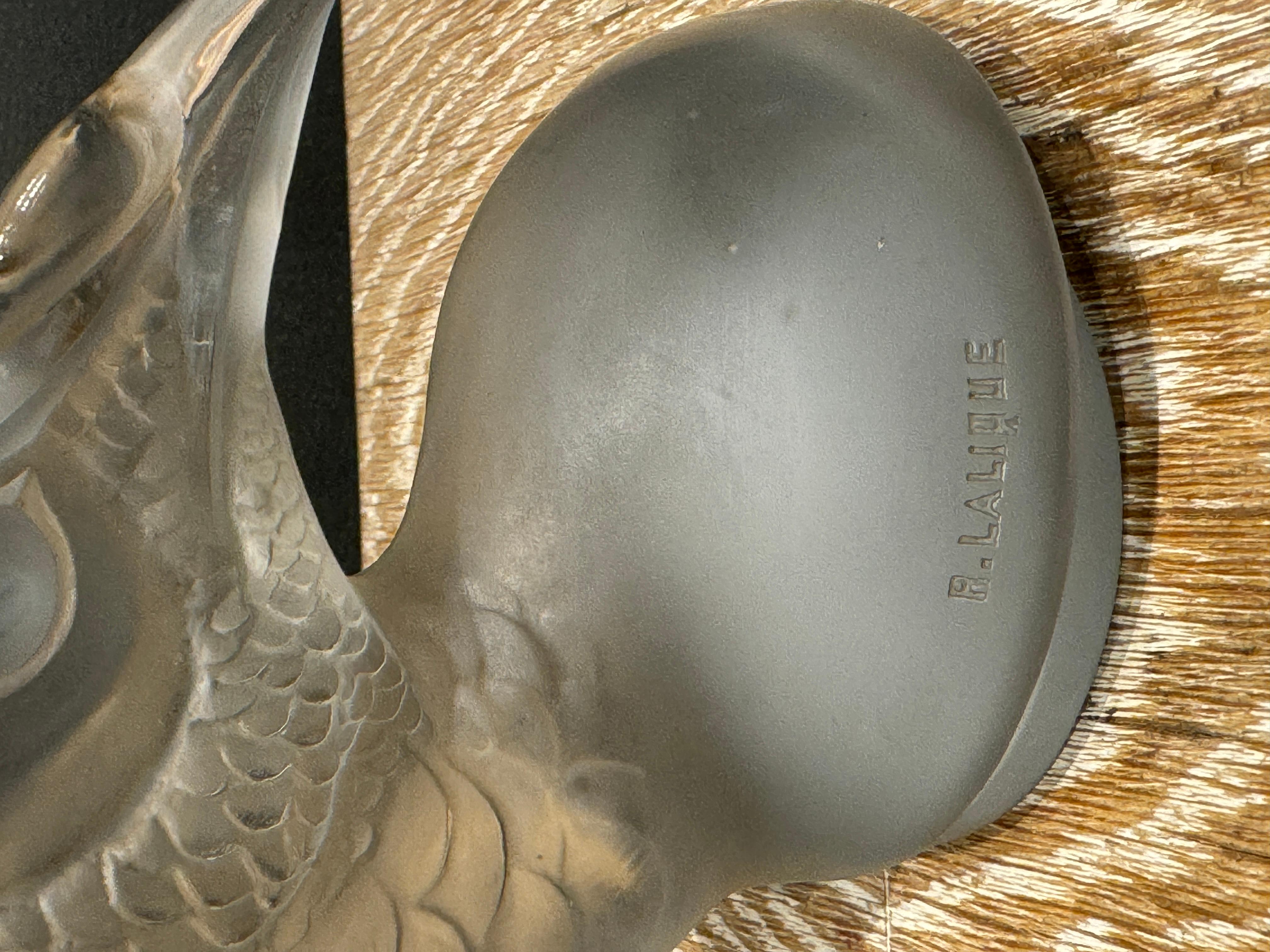 With the rise of the car industry , R.Lalique developed with his usual skills , a large choice of car mascots which were supposed to protect, bring luck and speed the the cars they adorned .

The study of the subjects and the quality of the glass is